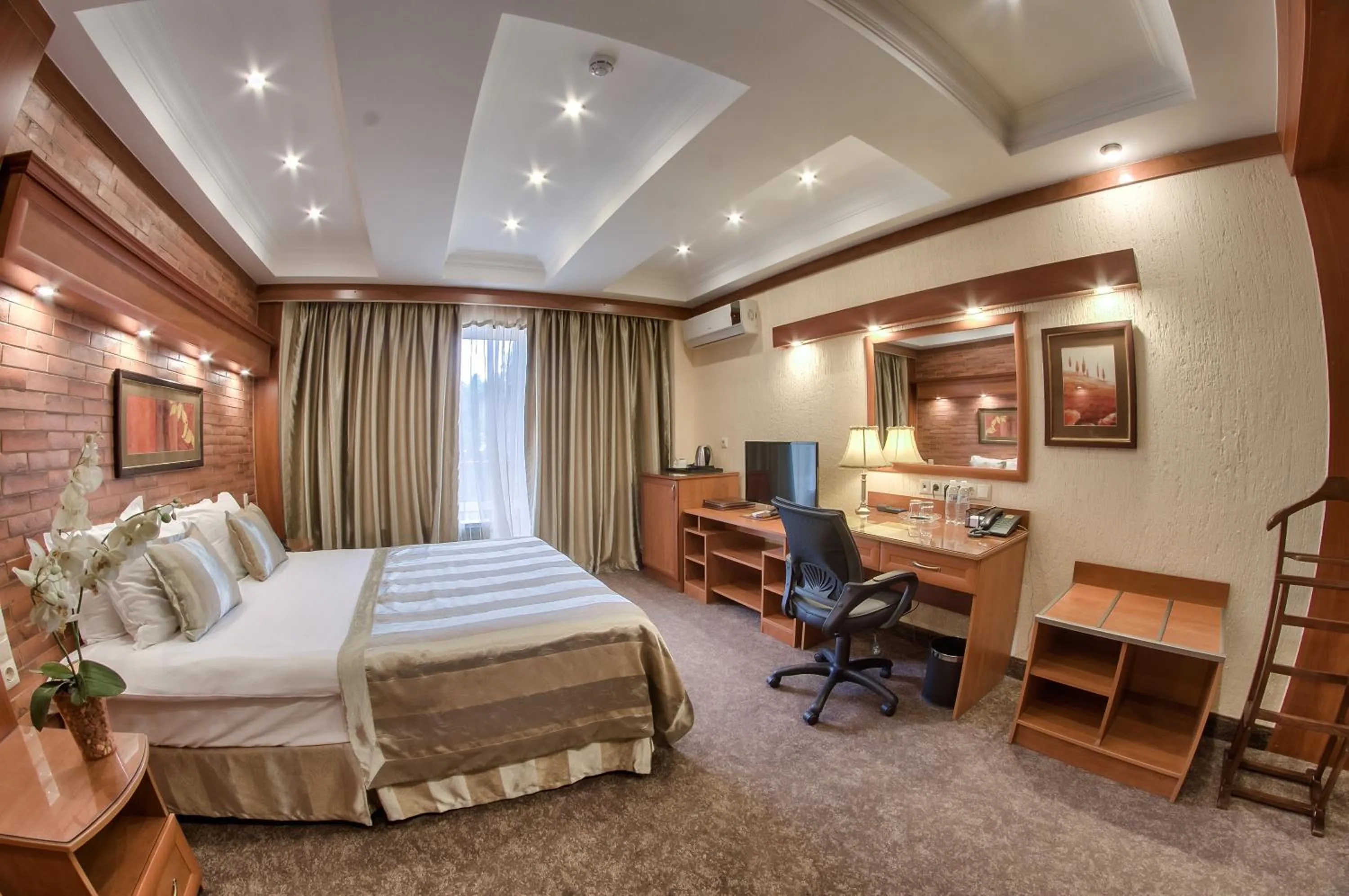 Photo of the whole room, Bed in Hotel Uyut Almaty