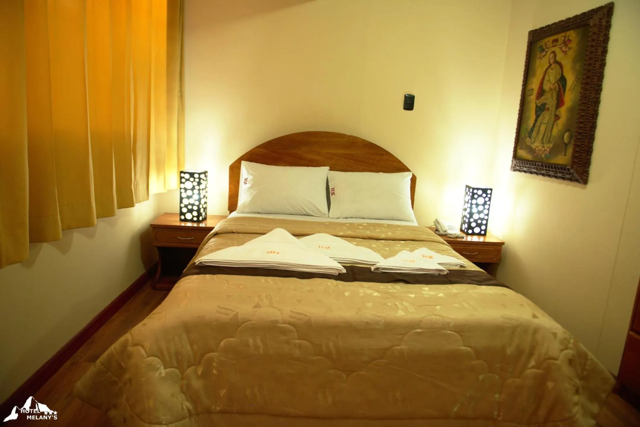 Bed in Hotel Melanys