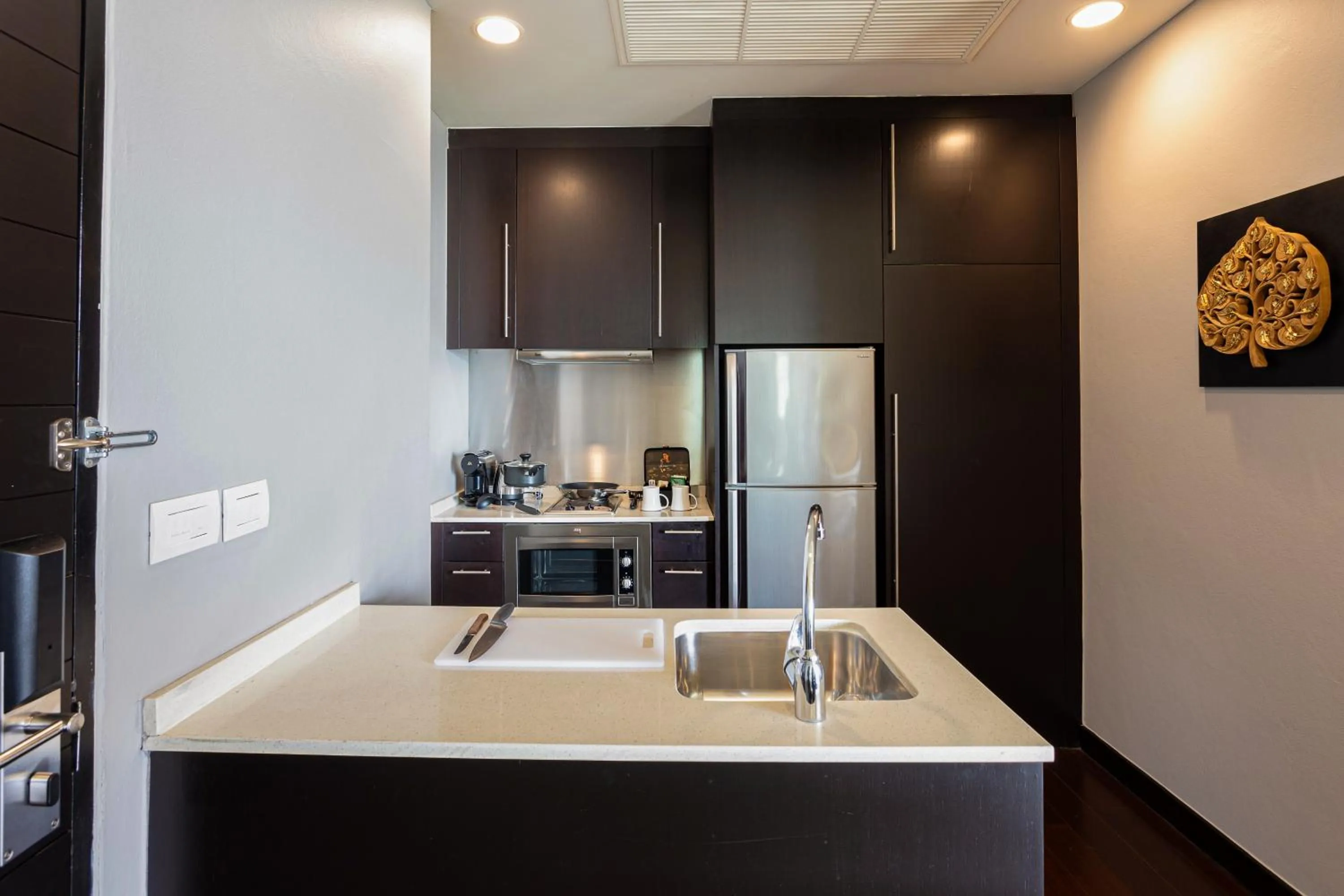 Kitchen or kitchenette in Chatrium Hotel Riverside Bangkok