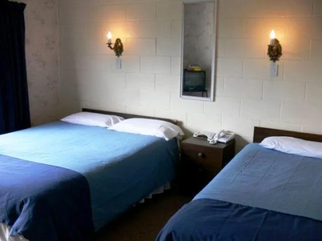 Bed in Glow Worm Motel