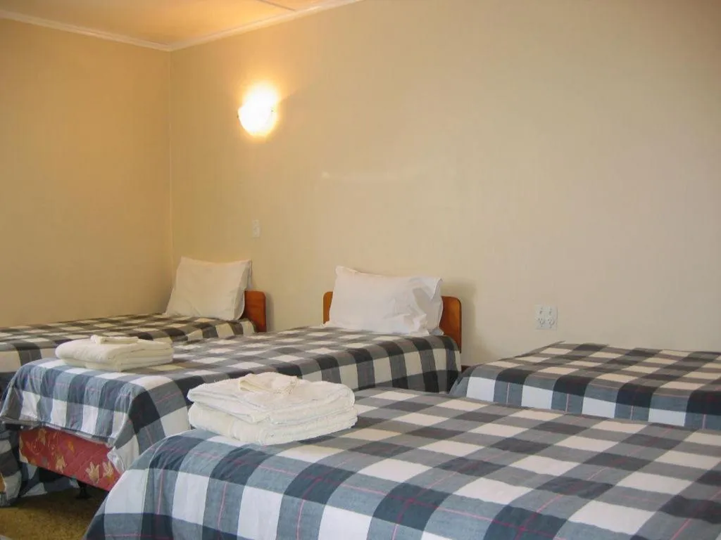 Bed in Glow Worm Motel