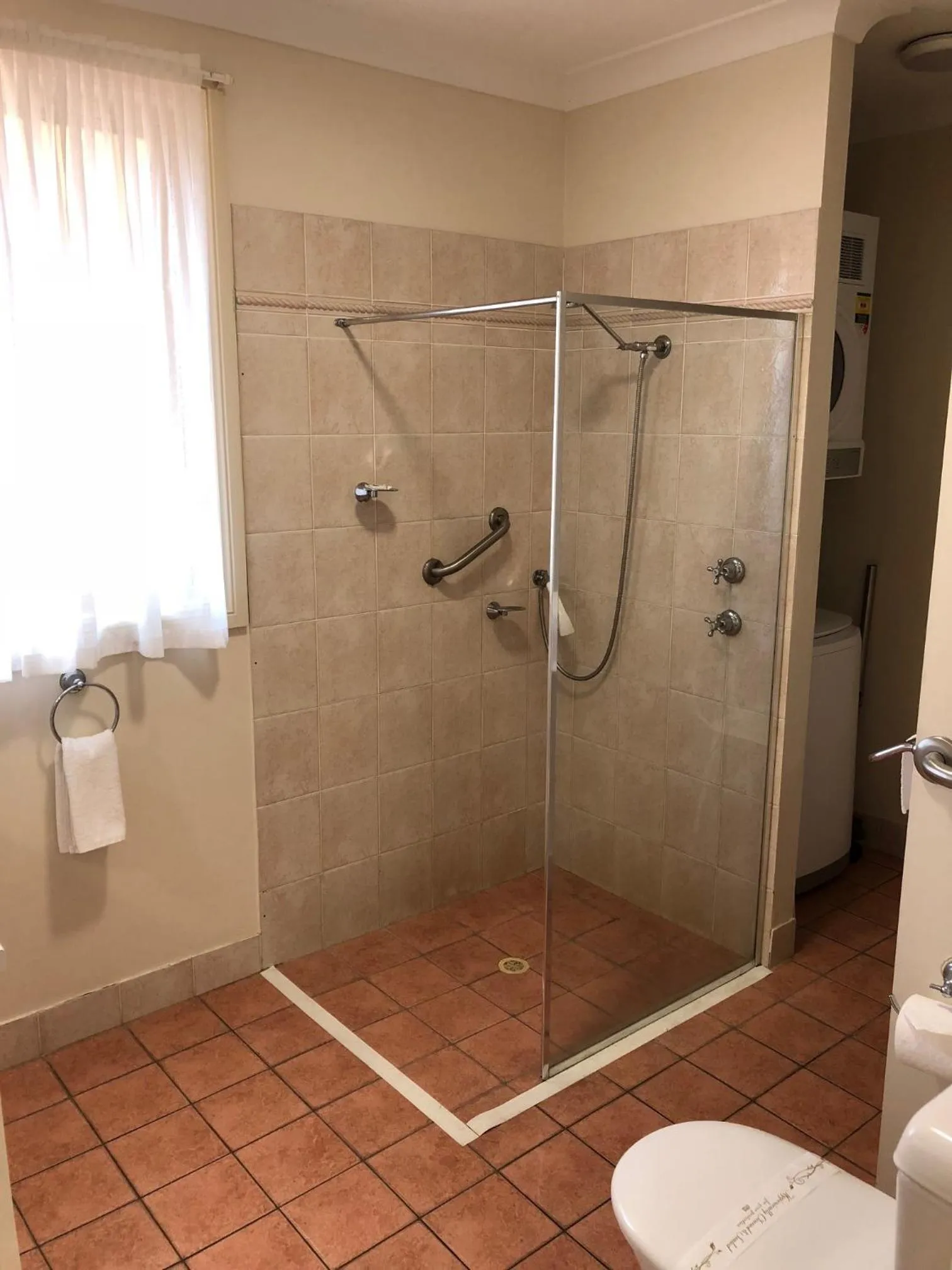 Shower in Beaches Serviced Apartments