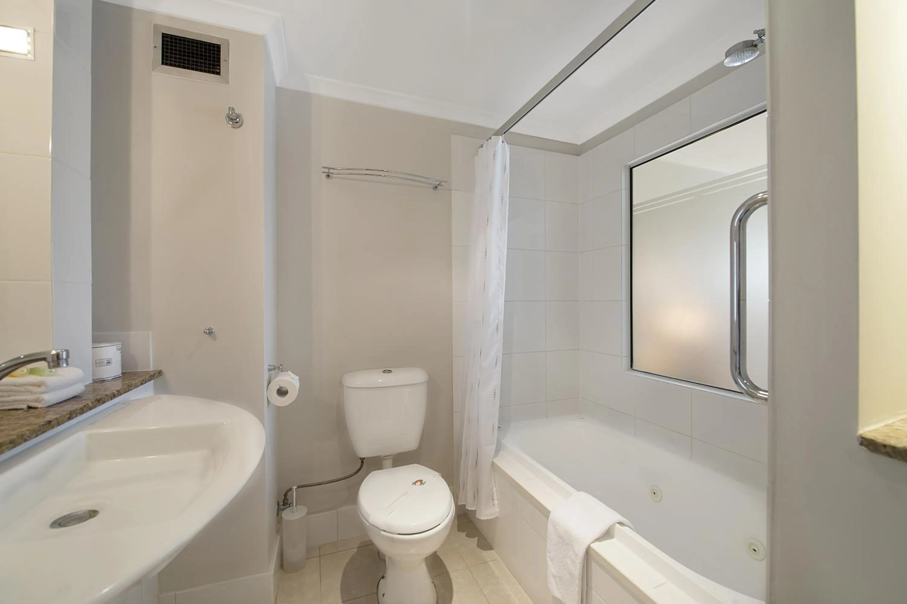 Bathroom in Airport Heritage Motel