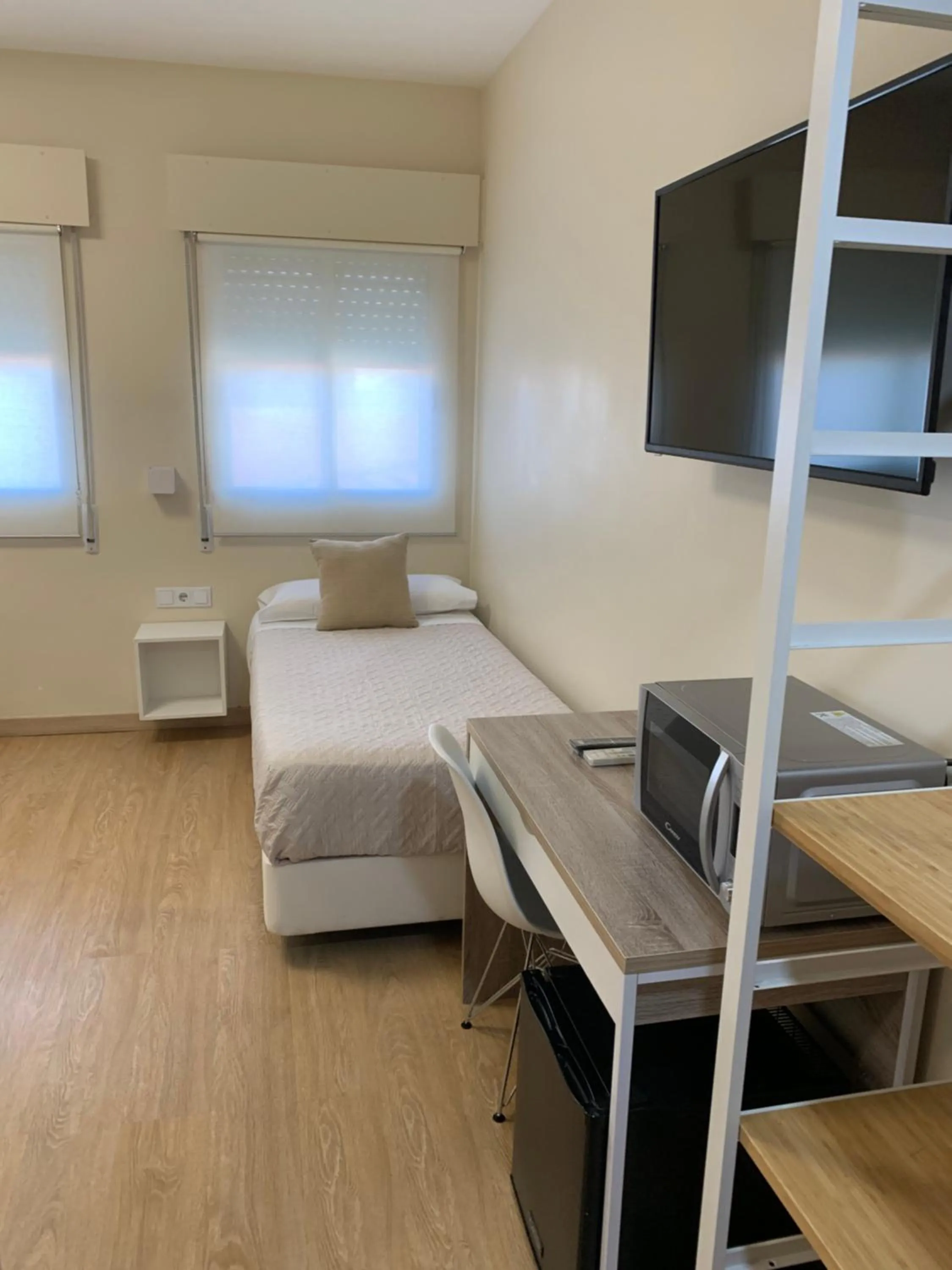 Bed in Hostal el Rocio