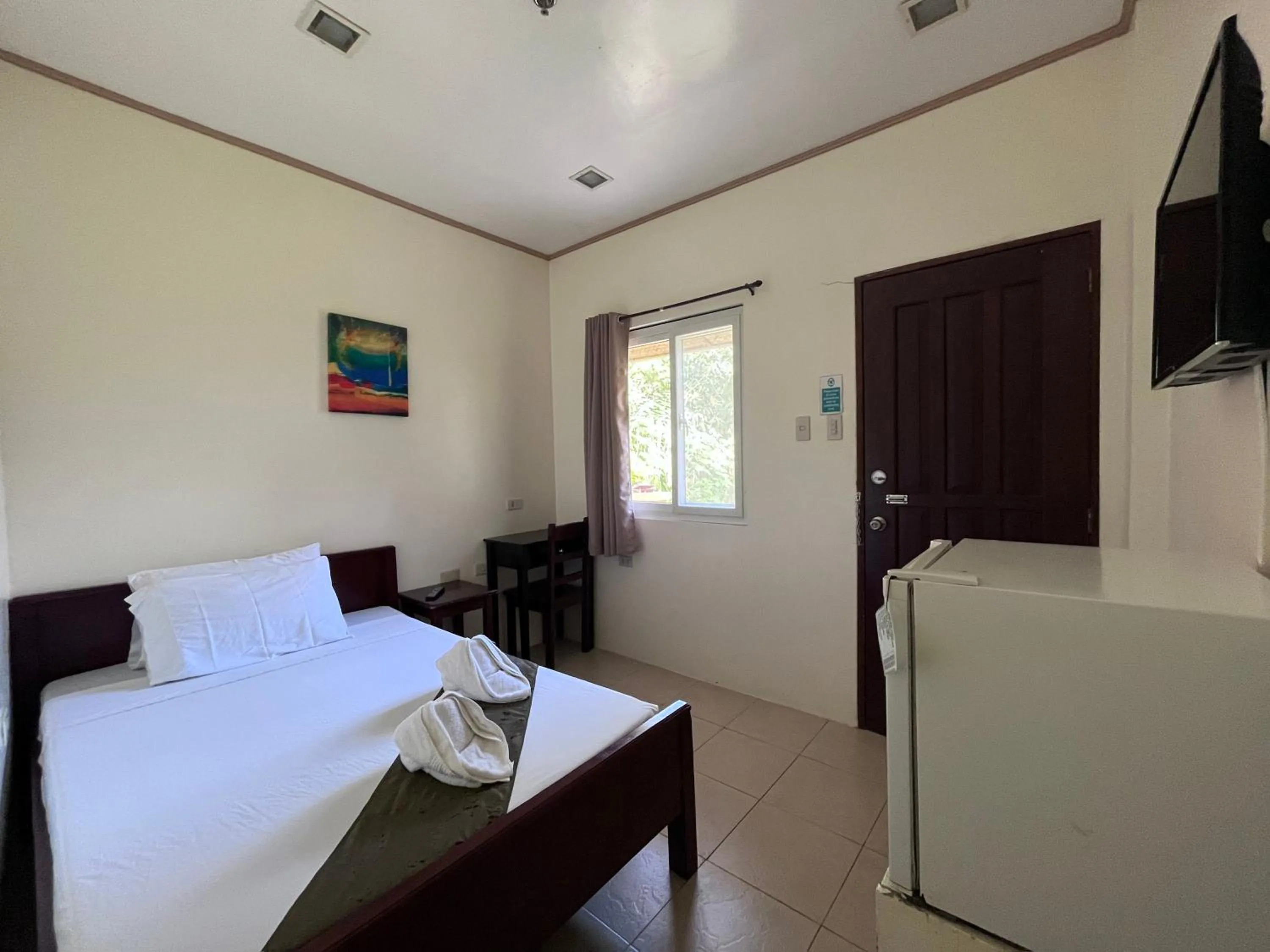 Bedroom, Bed in Blue Lagoon Inn & Suites