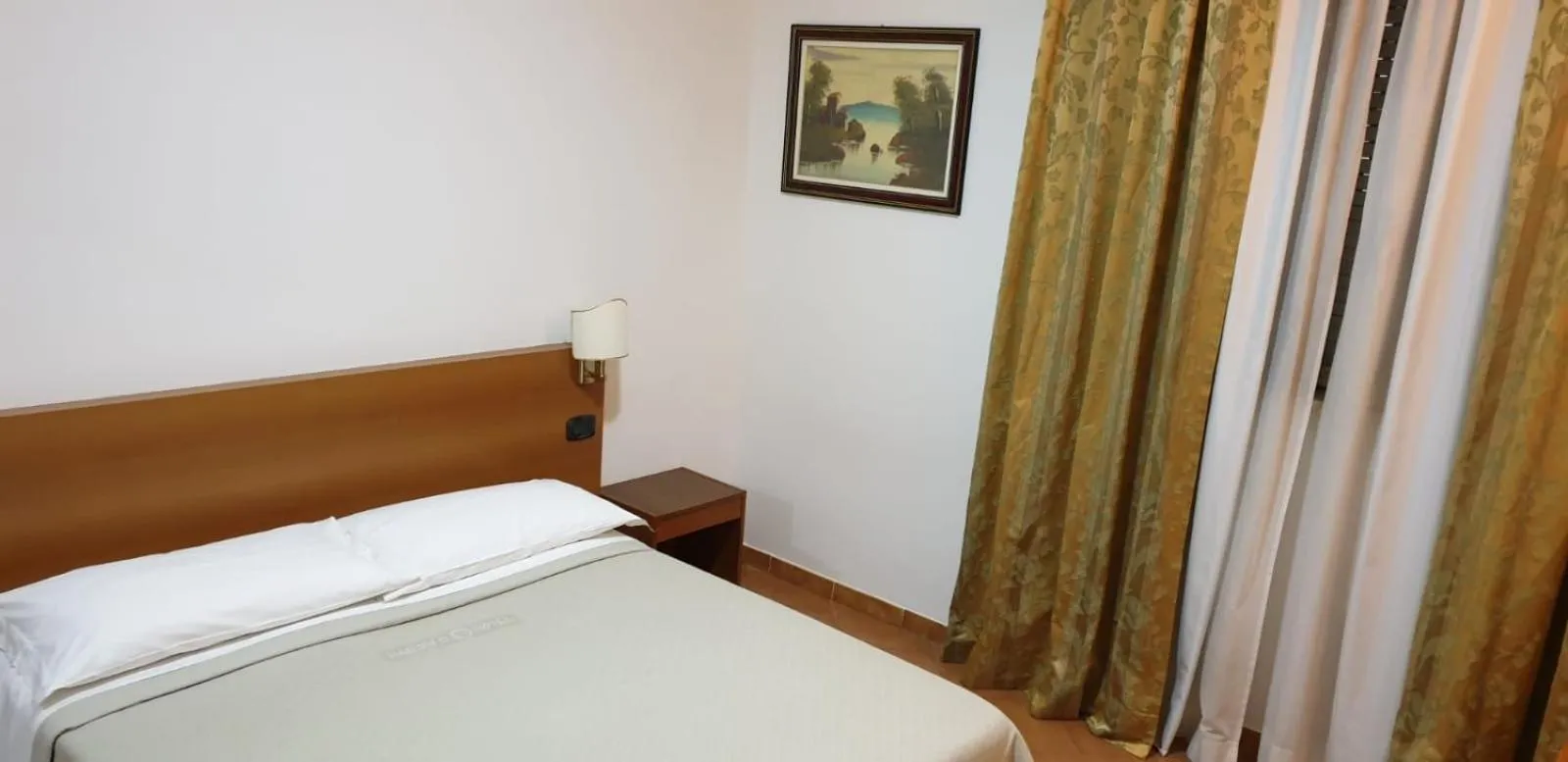 Bed in Grand Hotel Pavone