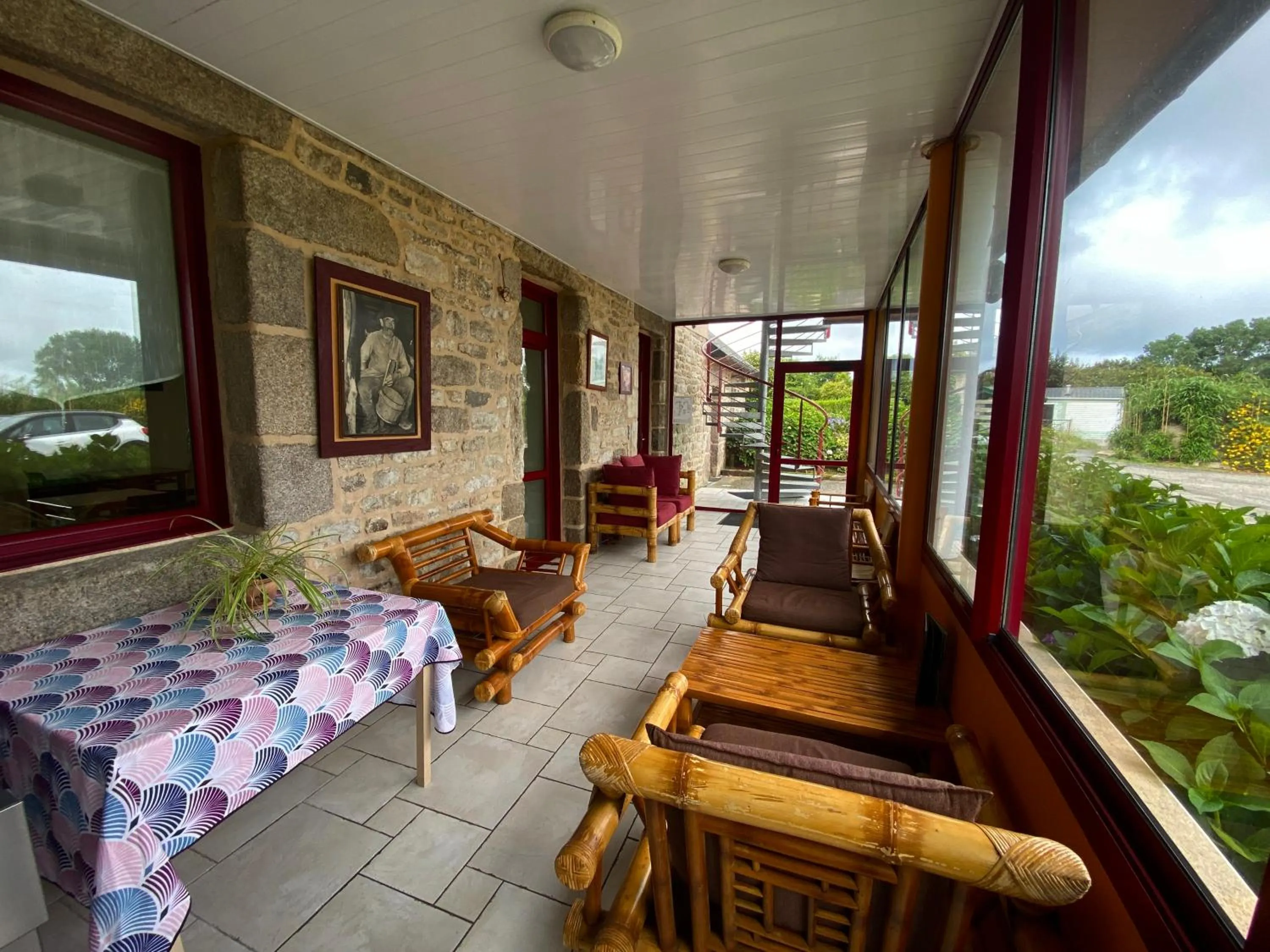 Communal lounge/ TV room in Domaine de Kerzuat