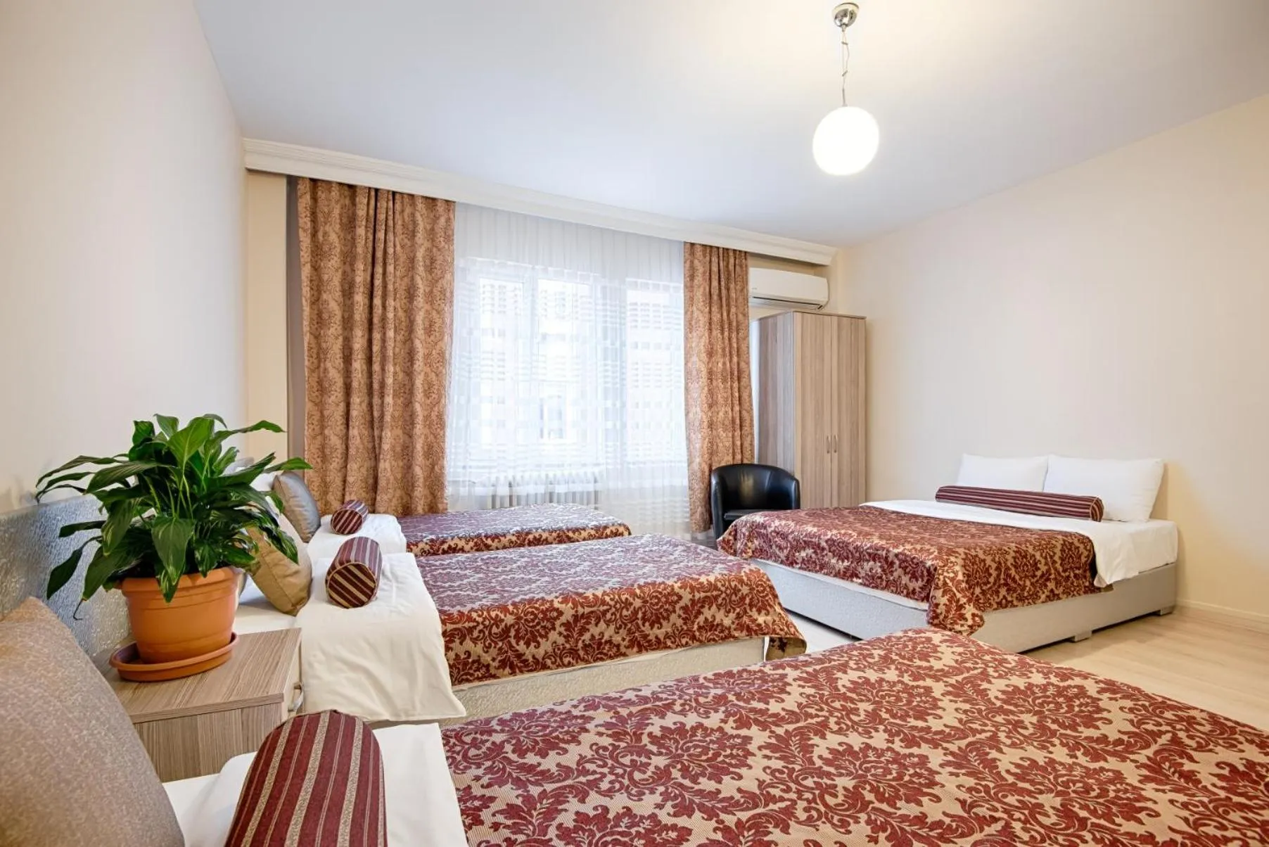 Bed in DİNAR HOTEL