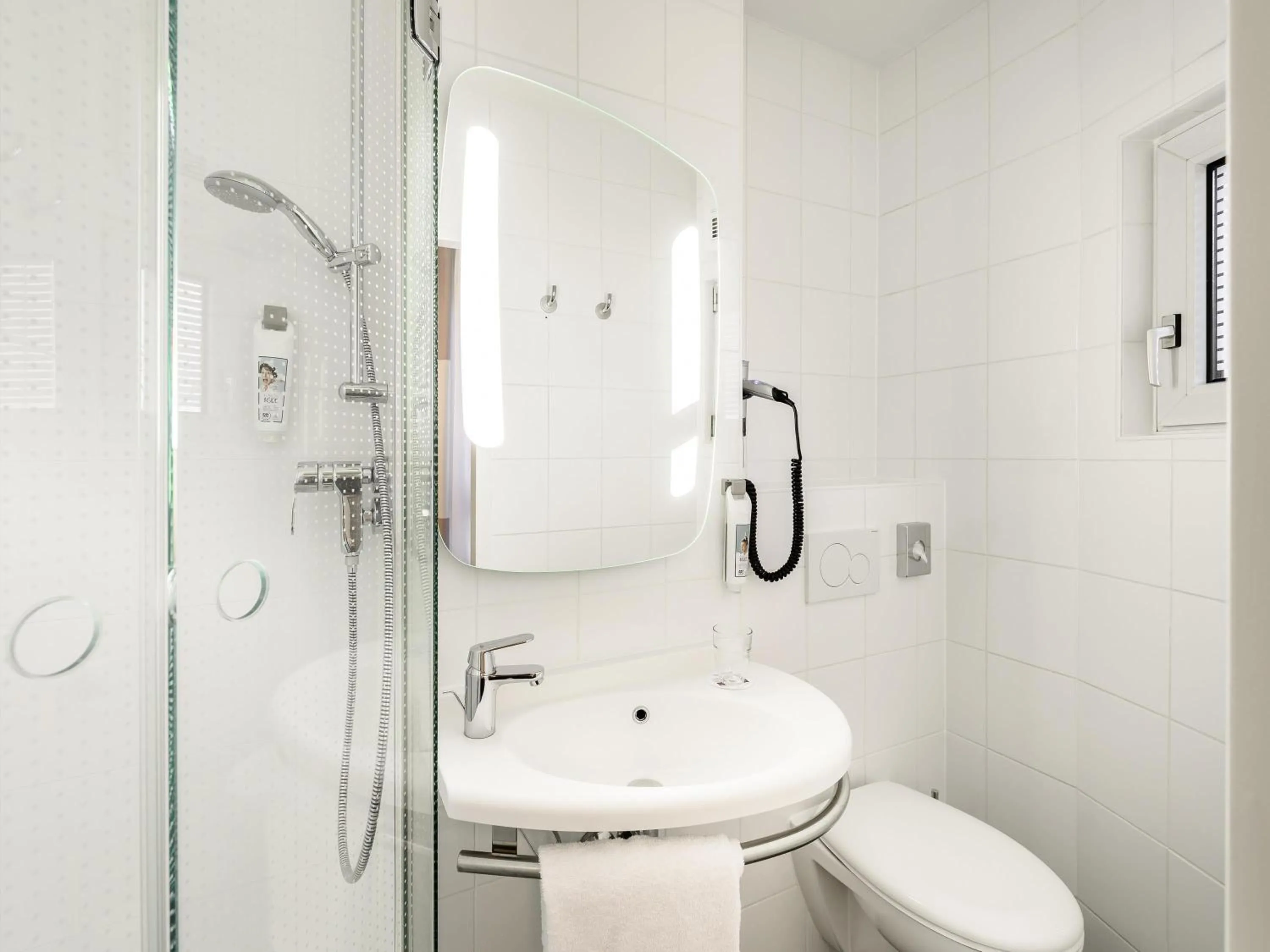 Bedroom in ibis Hotel München City