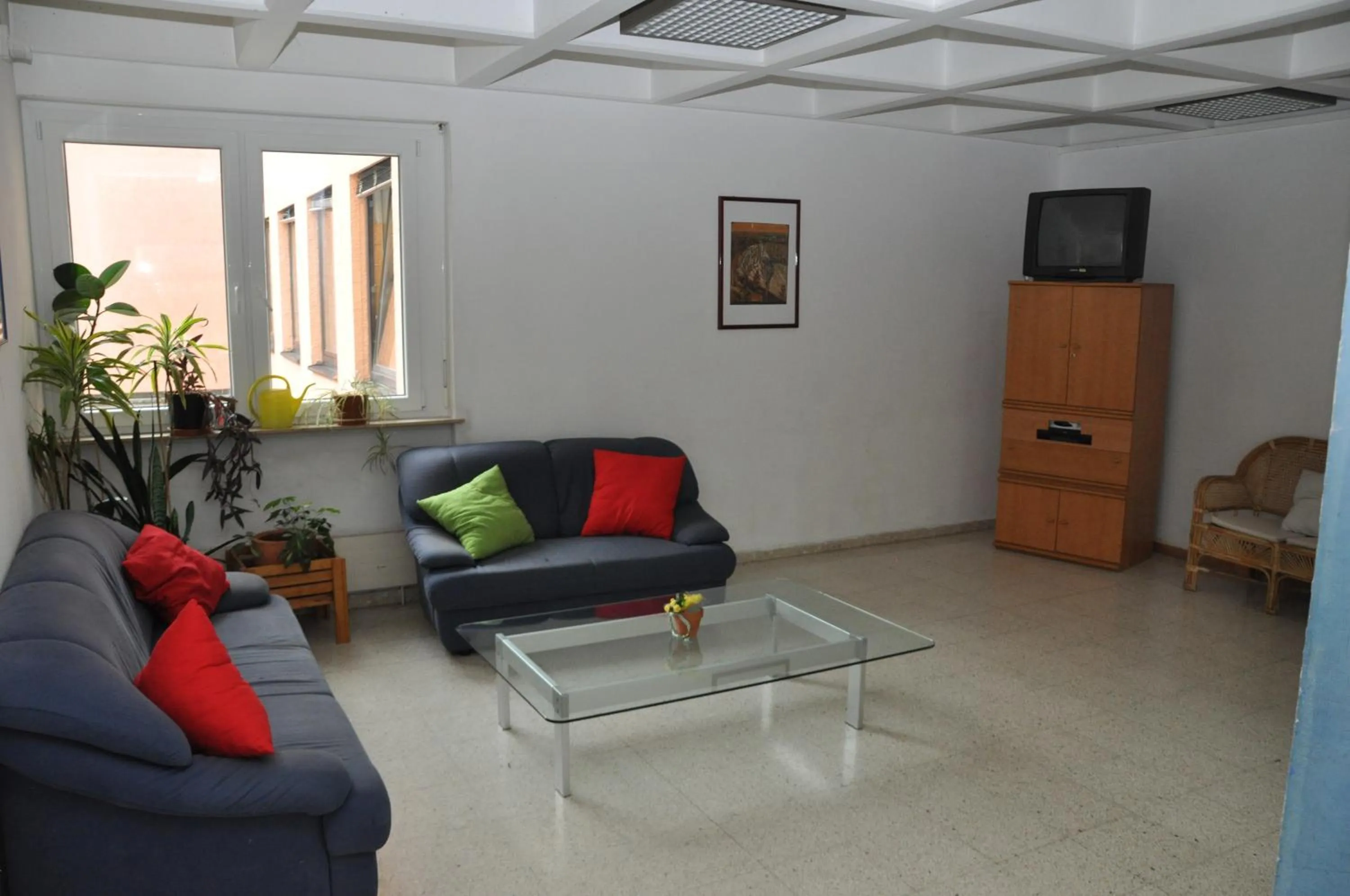 Communal lounge/ TV room in Eduard-Heinrich-Haus, Hostel