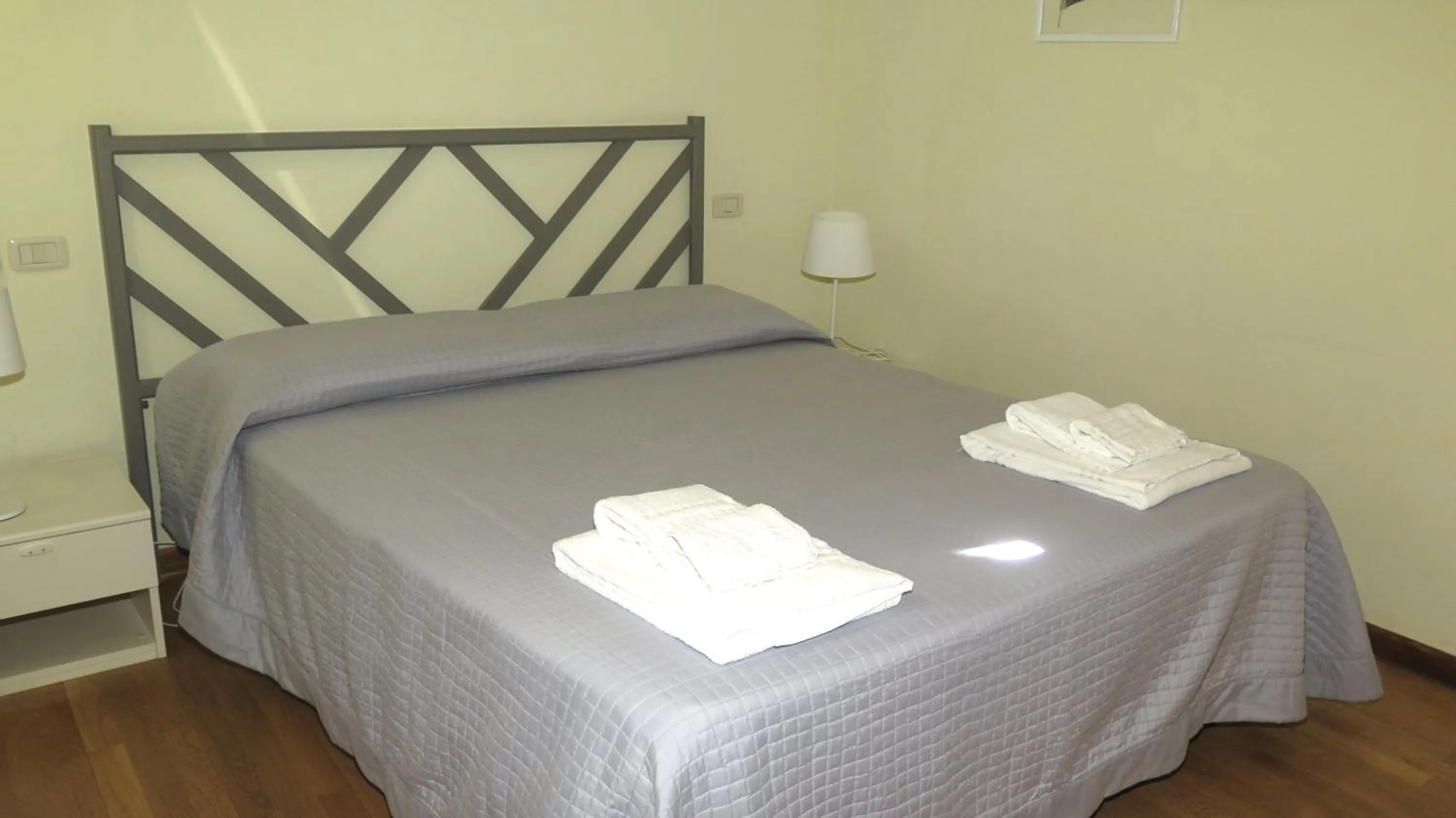 Bedroom, Bed in Residenza Turistico Alberghiera Corallo