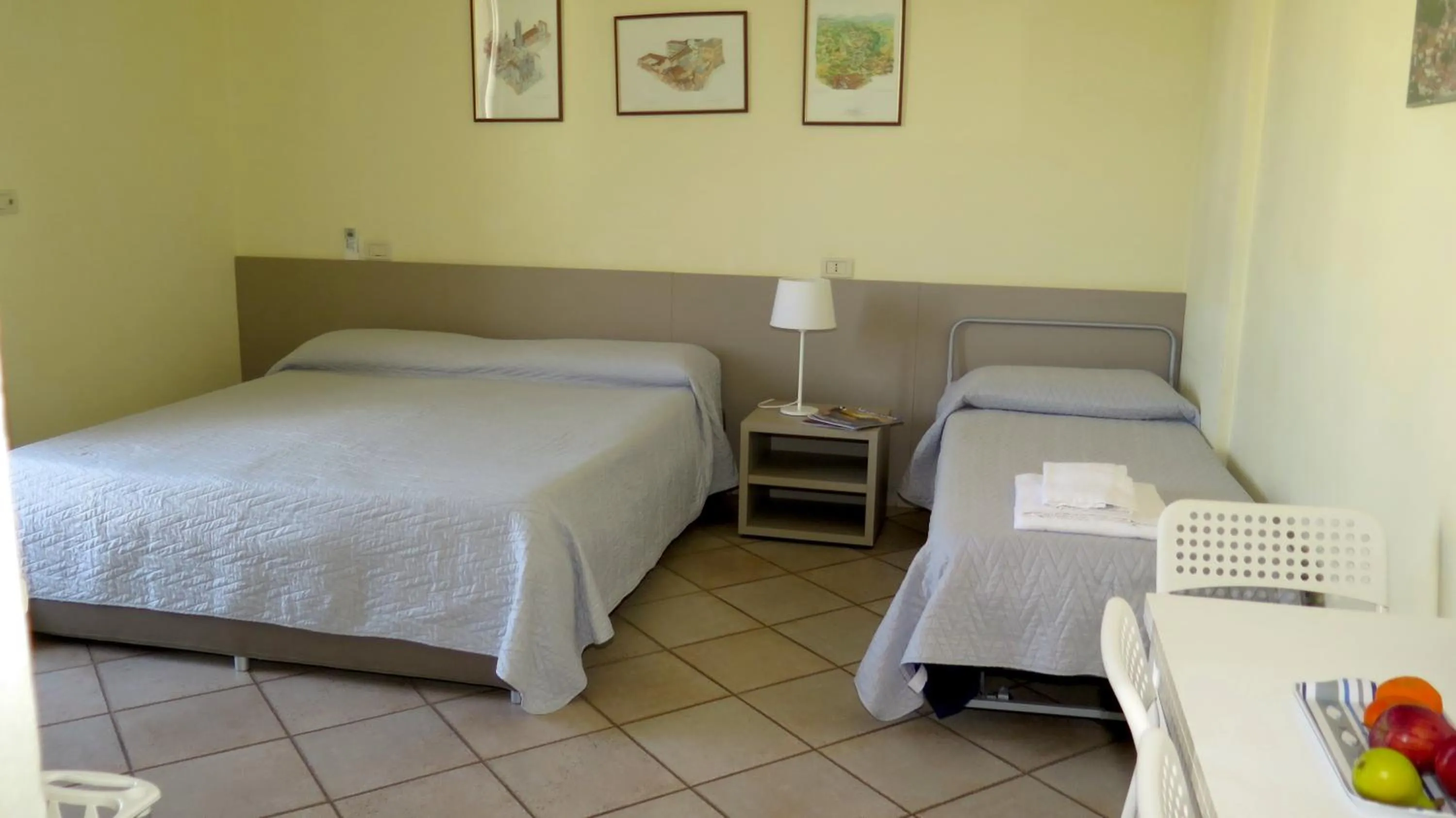 Photo of the whole room, Bed in Residenza Turistico Alberghiera Corallo