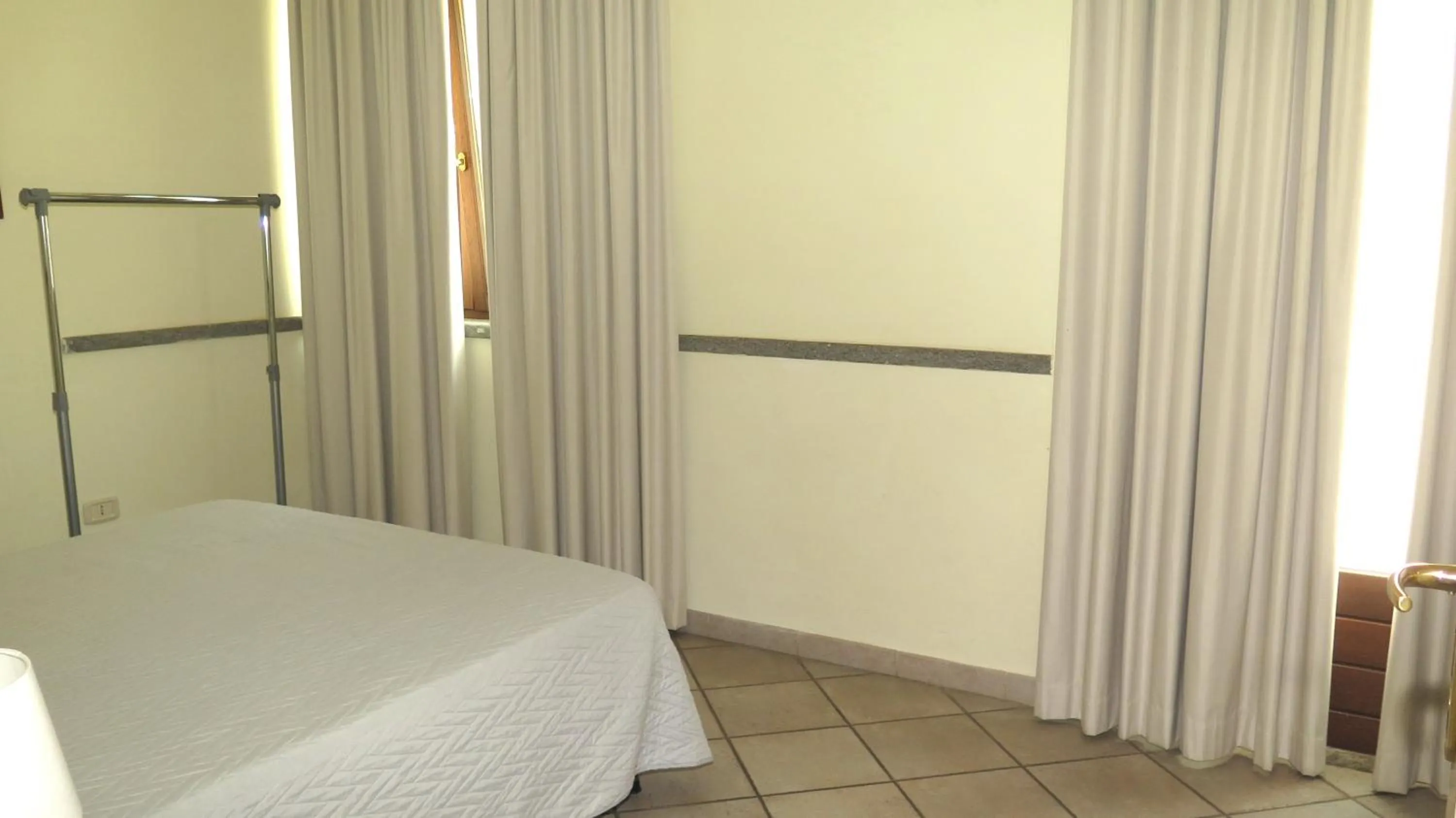 Bedroom, Bed in Residenza Turistico Alberghiera Corallo