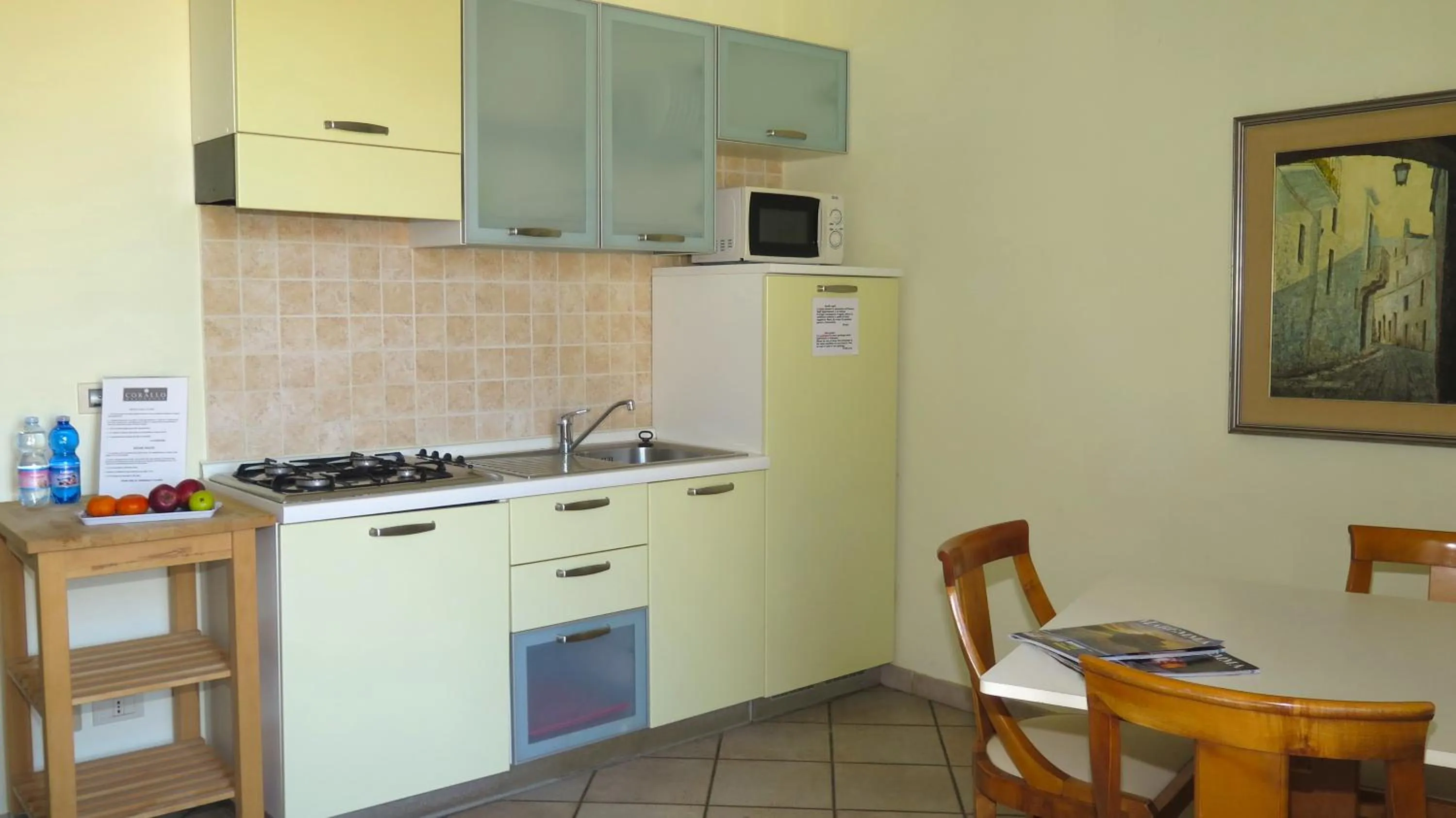 Kitchen or kitchenette in Residenza Turistico Alberghiera Corallo