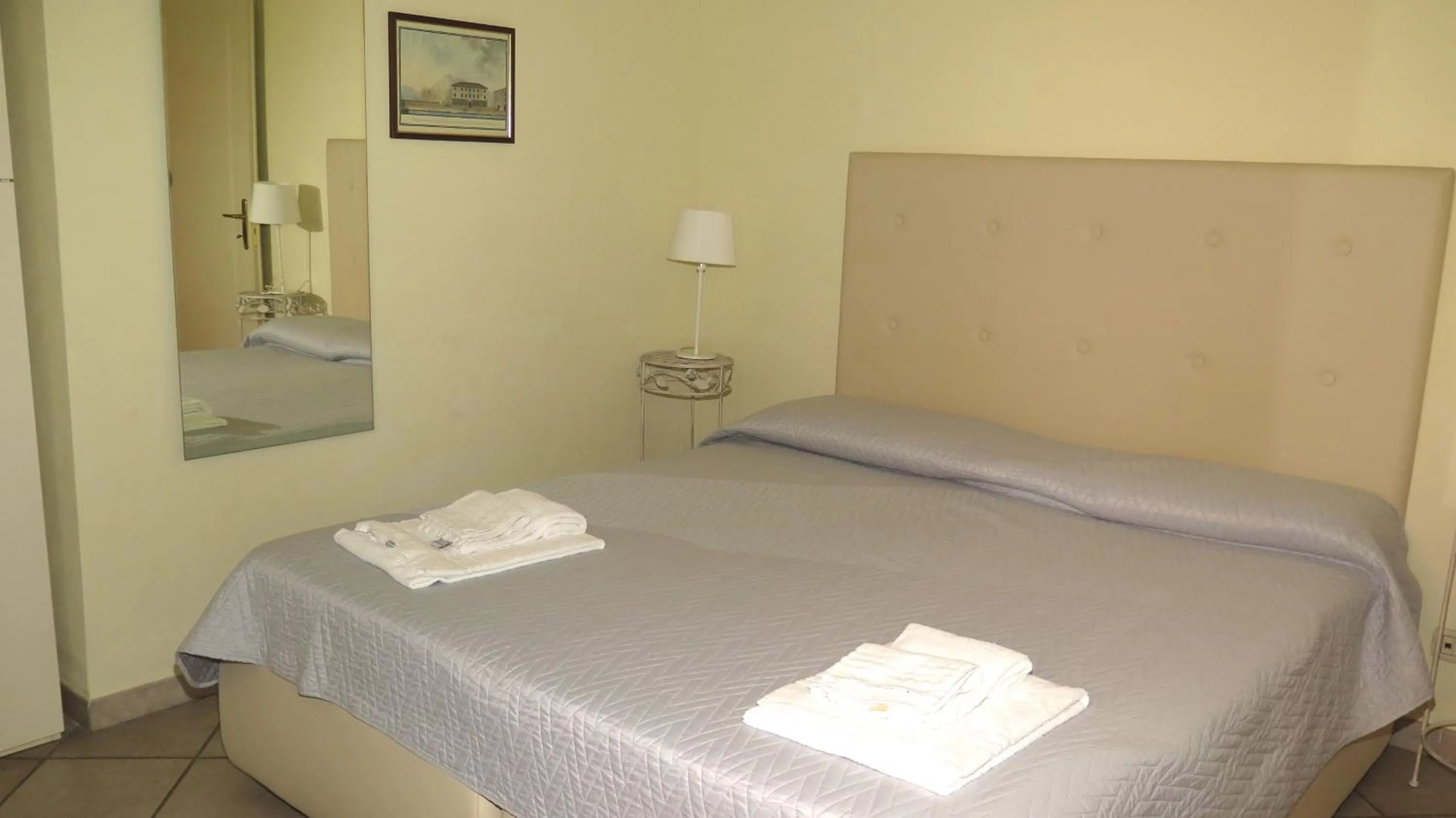 Bed in Residenza Turistico Alberghiera Corallo