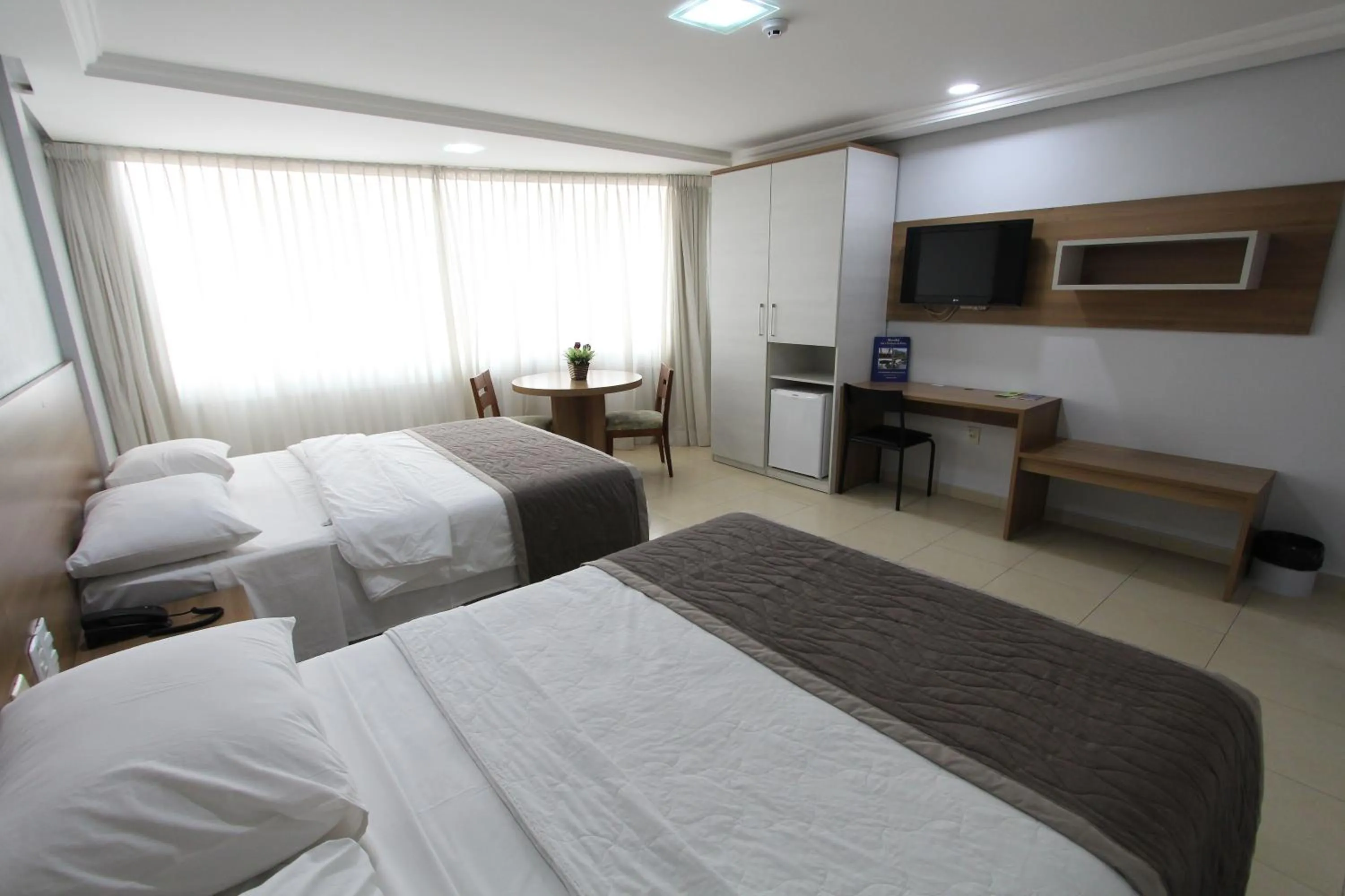 Bed in Golden Ville Hotel