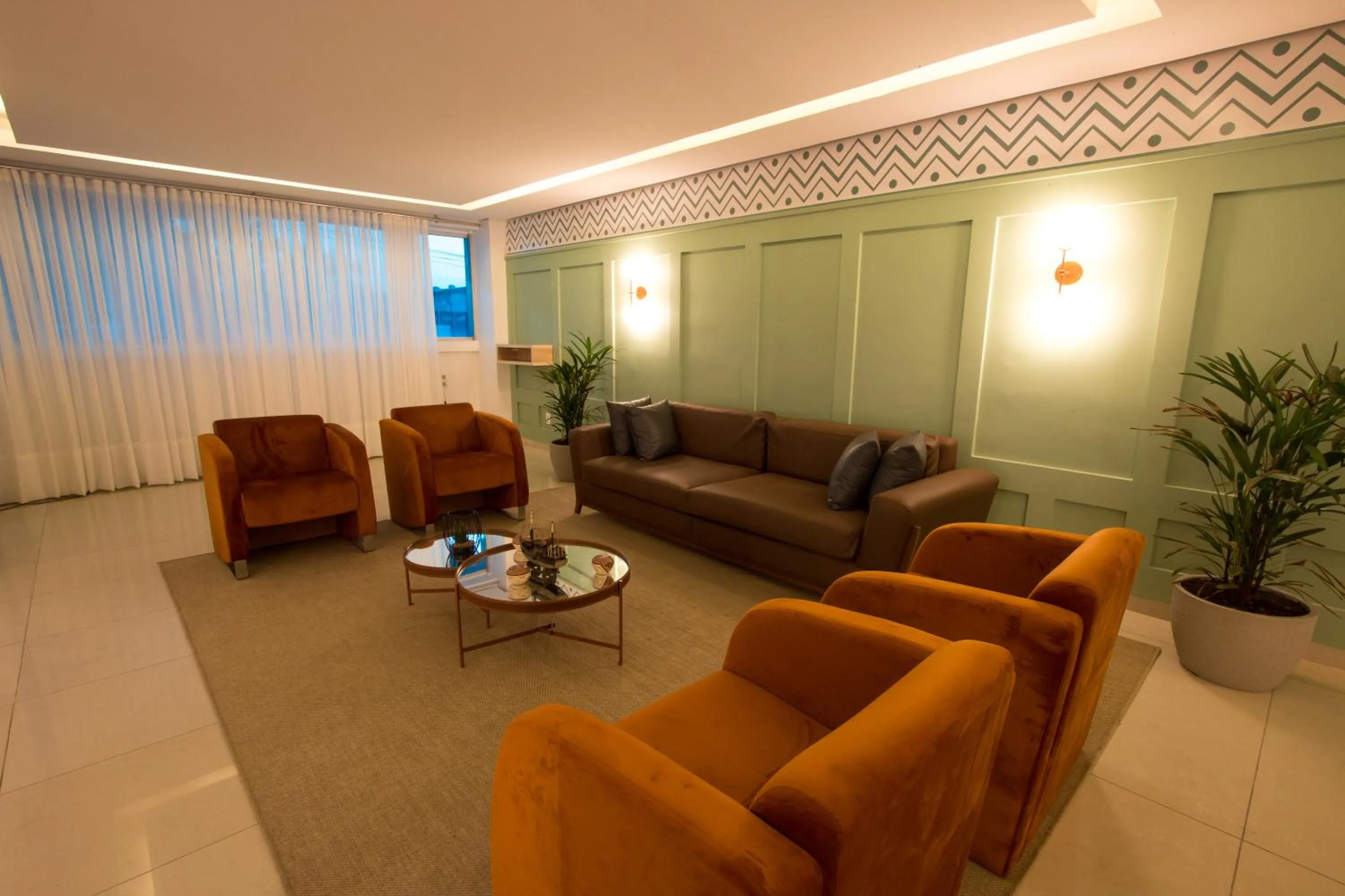 Living room in Golden Ville Hotel