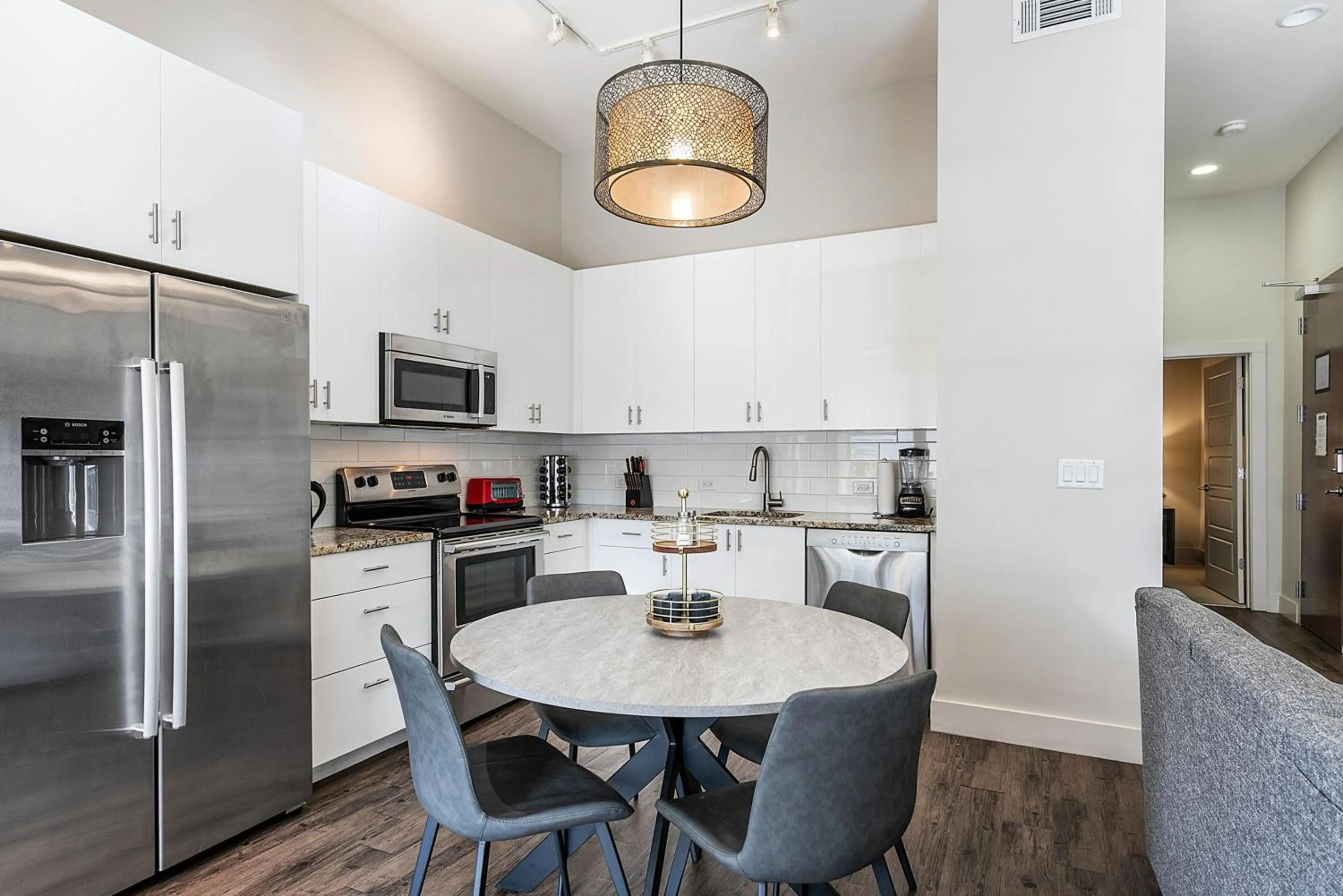 Kitchen or kitchenette in Modern & Fully Furnished Apartments in the Heart of the City