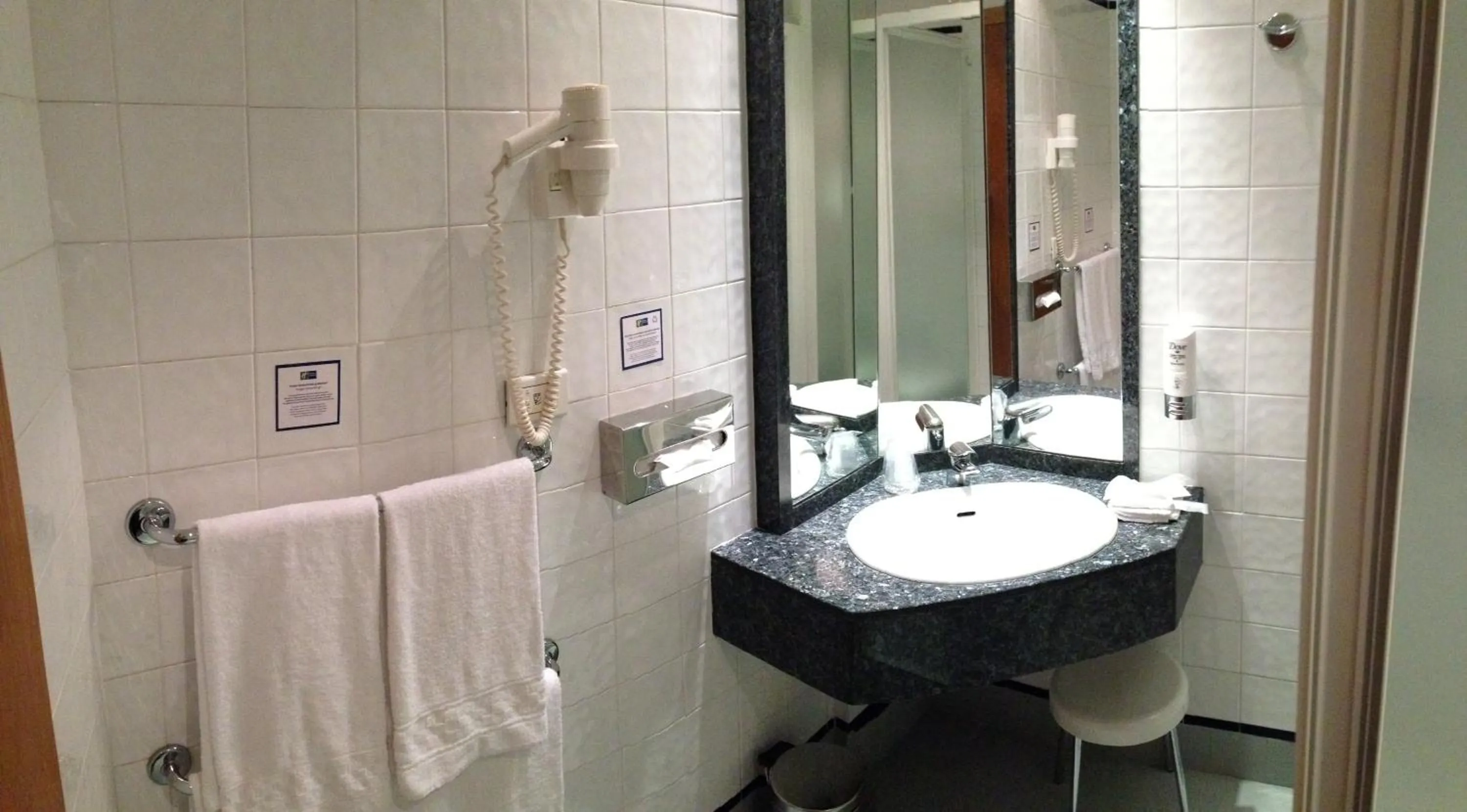 Bathroom in City Hotel & Suites
