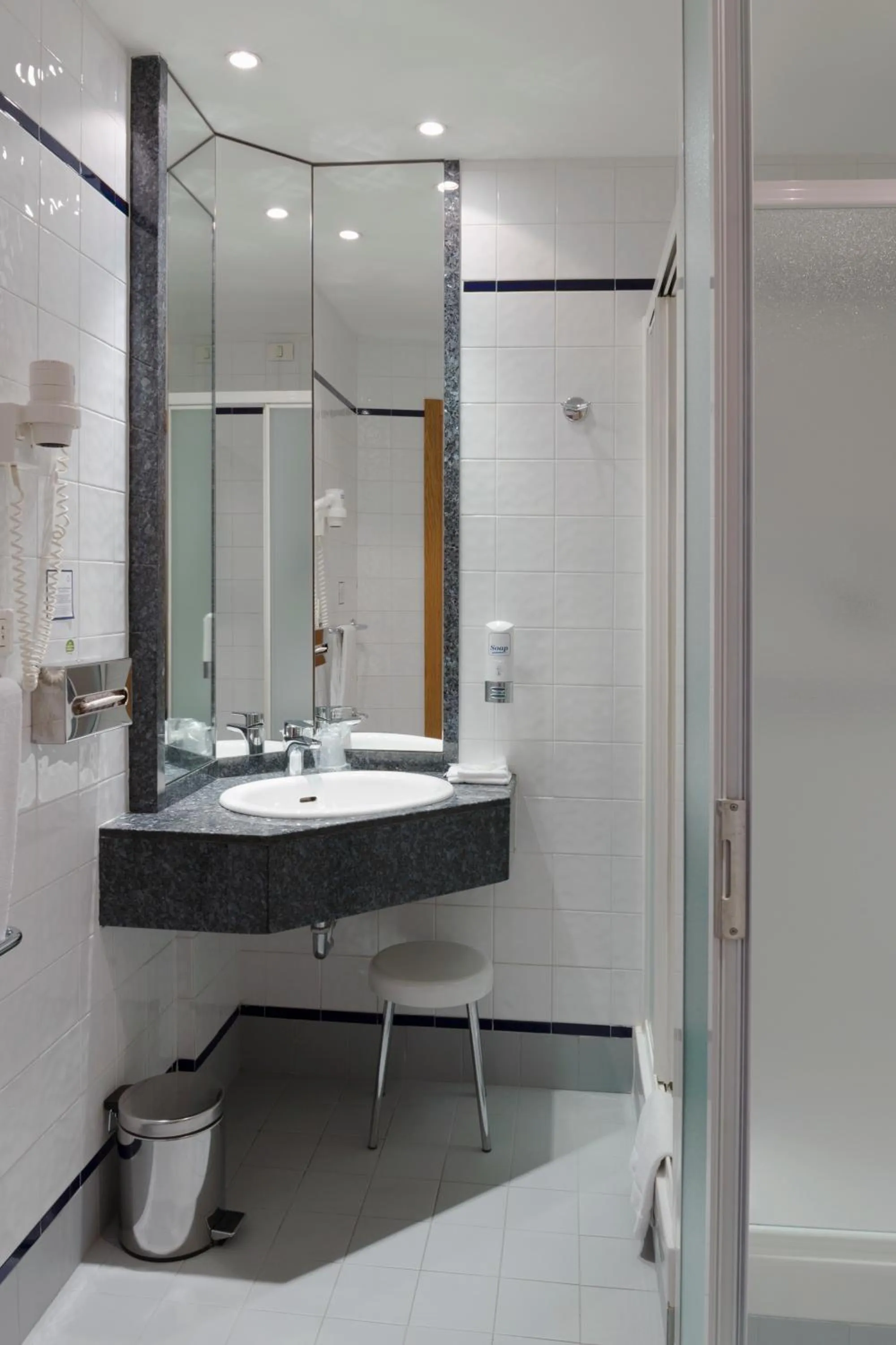 Bathroom in City Hotel & Suites