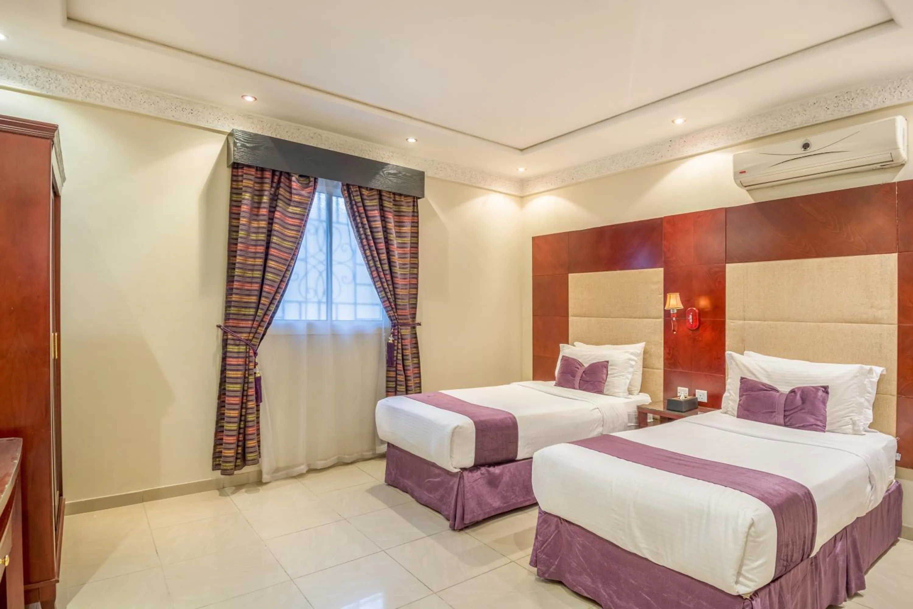 Bed in Dar NEYAARA SERVICED APARTMENTS