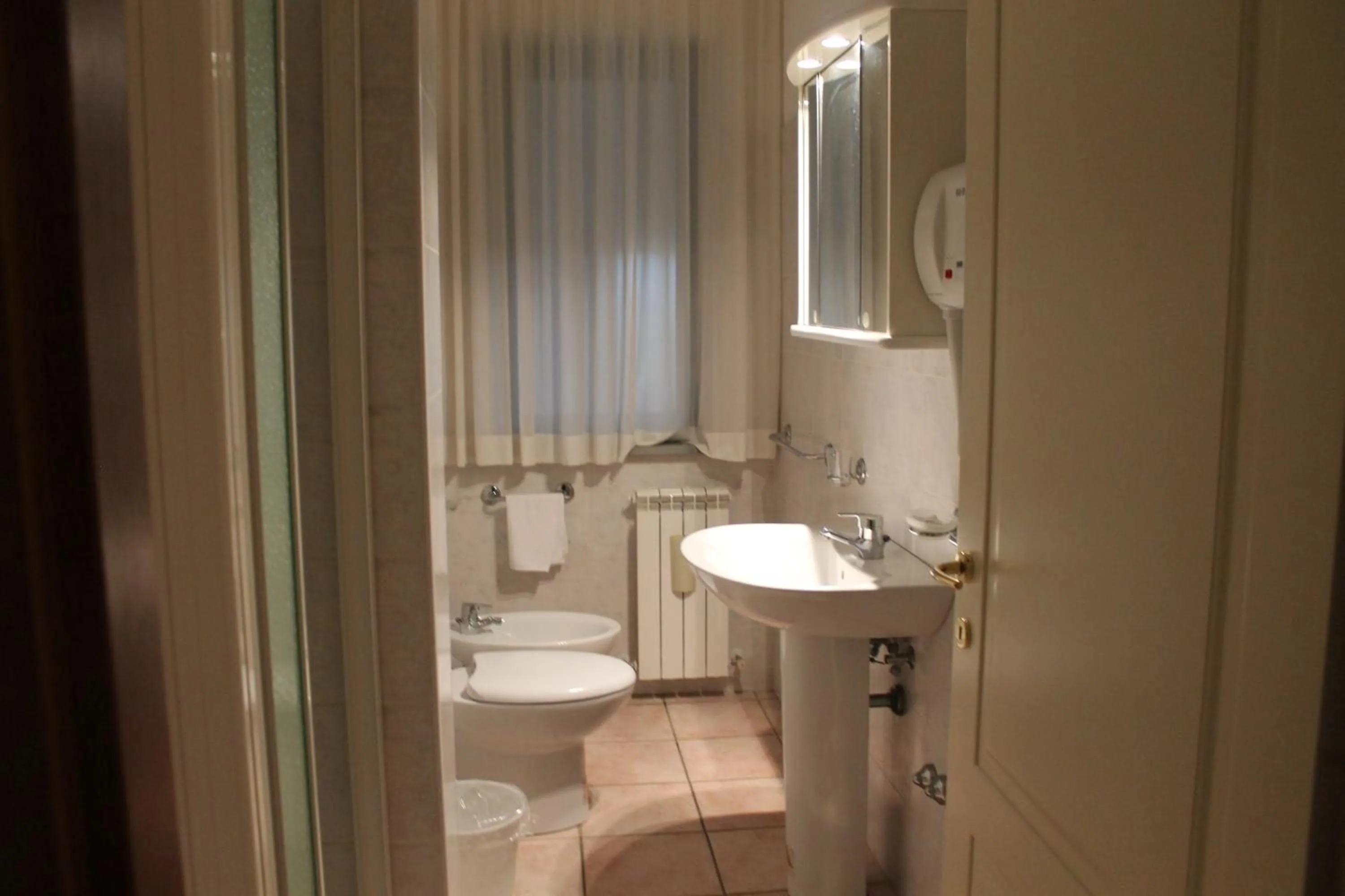 Bathroom in Residence La Piscina