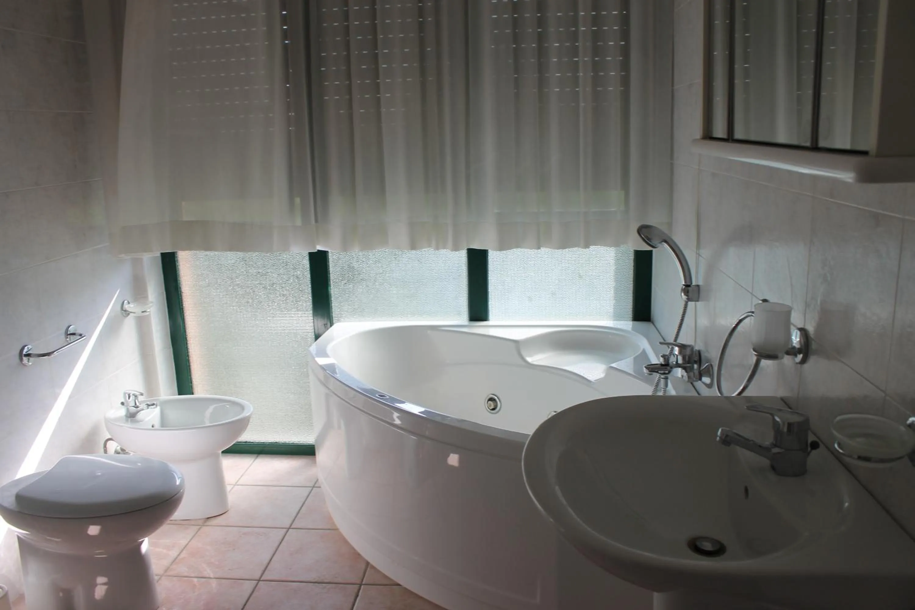 Bathroom in Residence La Piscina