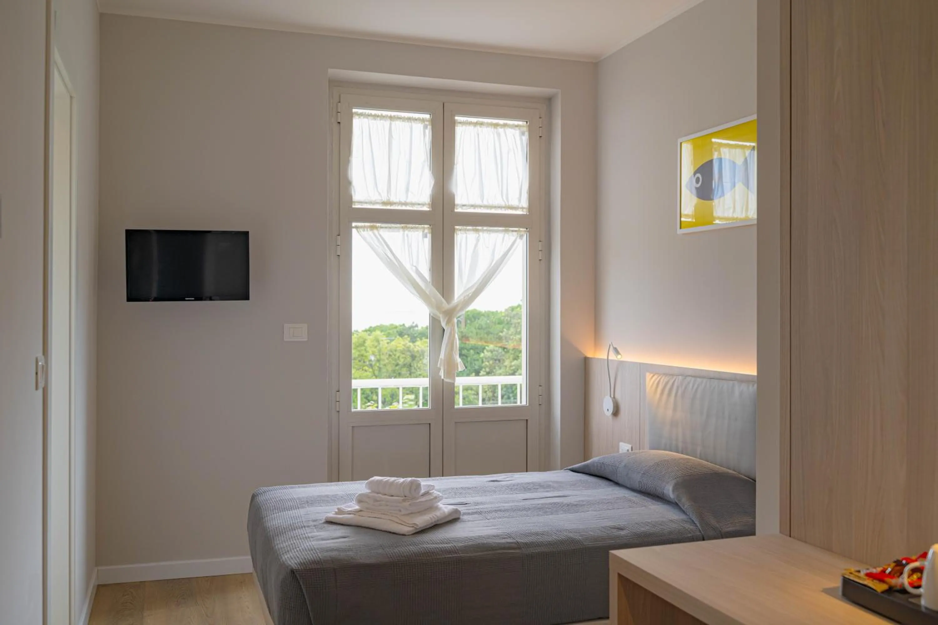 Bed in Hotel Tritone