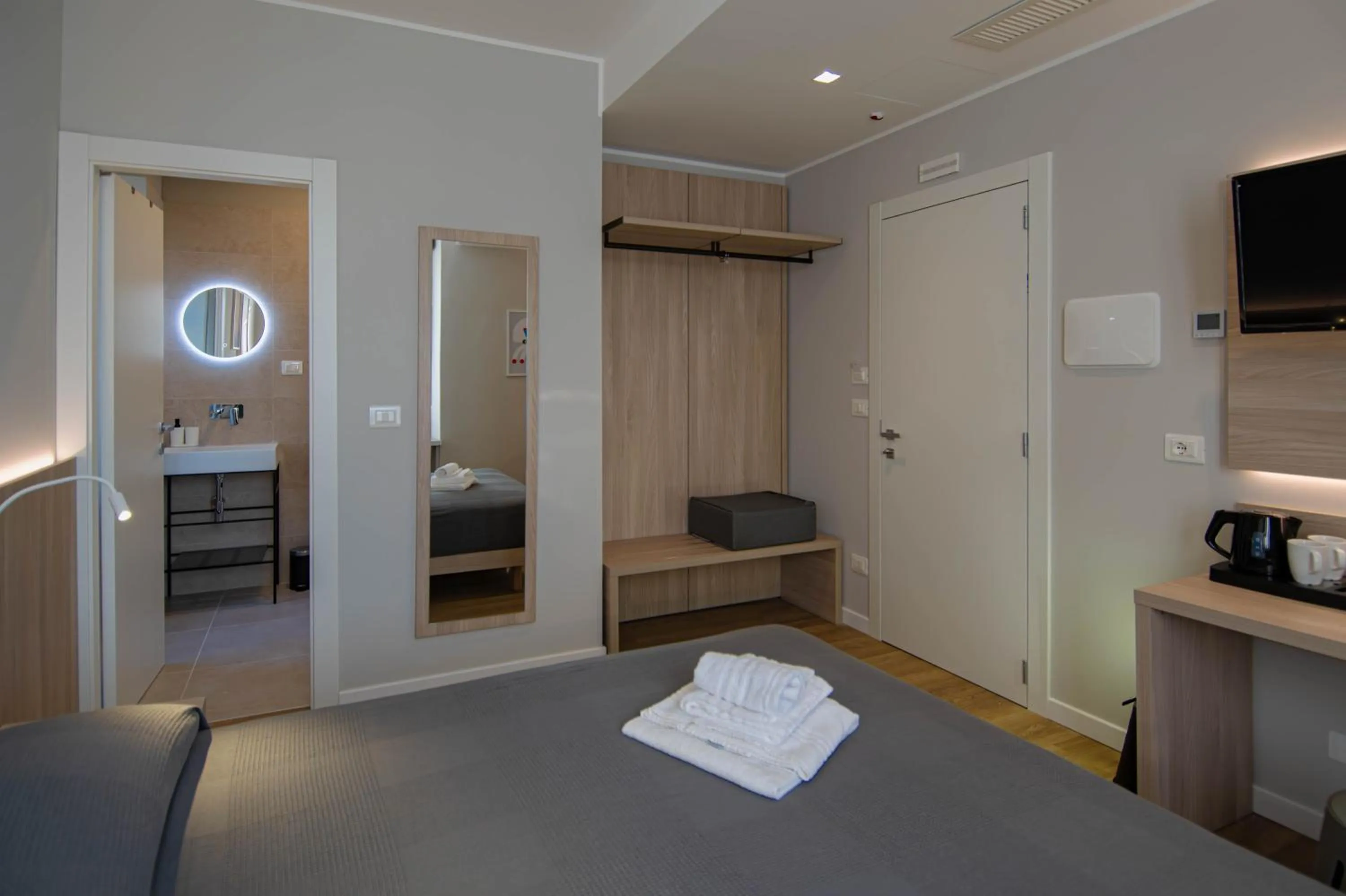 Bed in Hotel Tritone