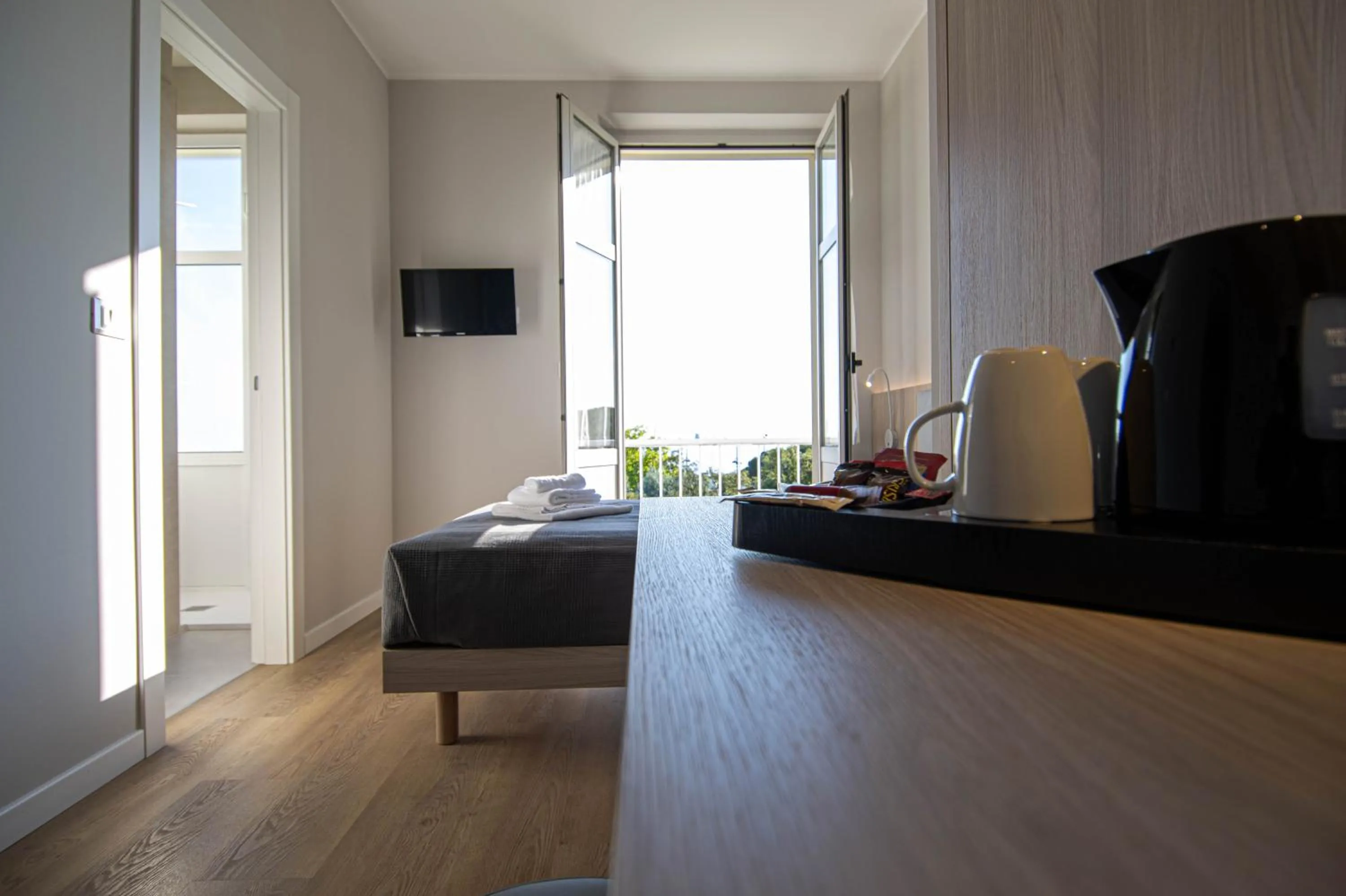 Bed in Hotel Tritone