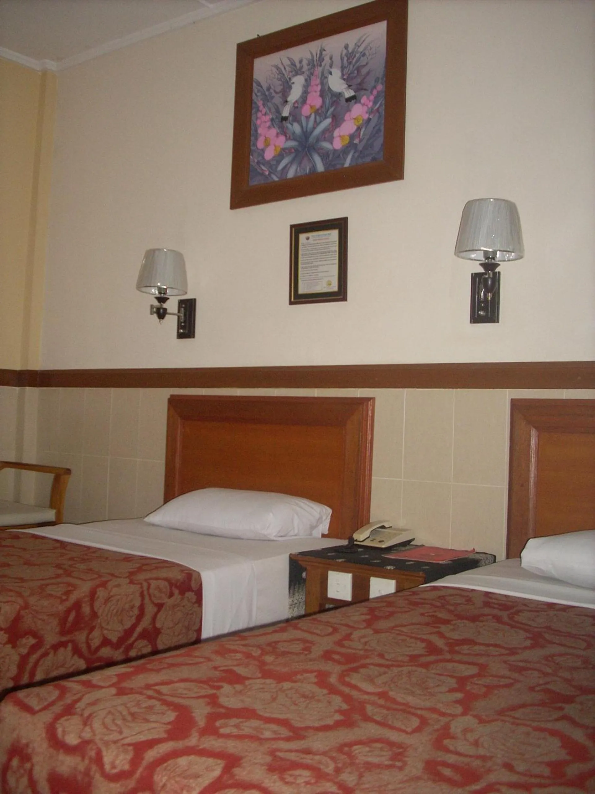 Bed in Hotel Sorga Cottages