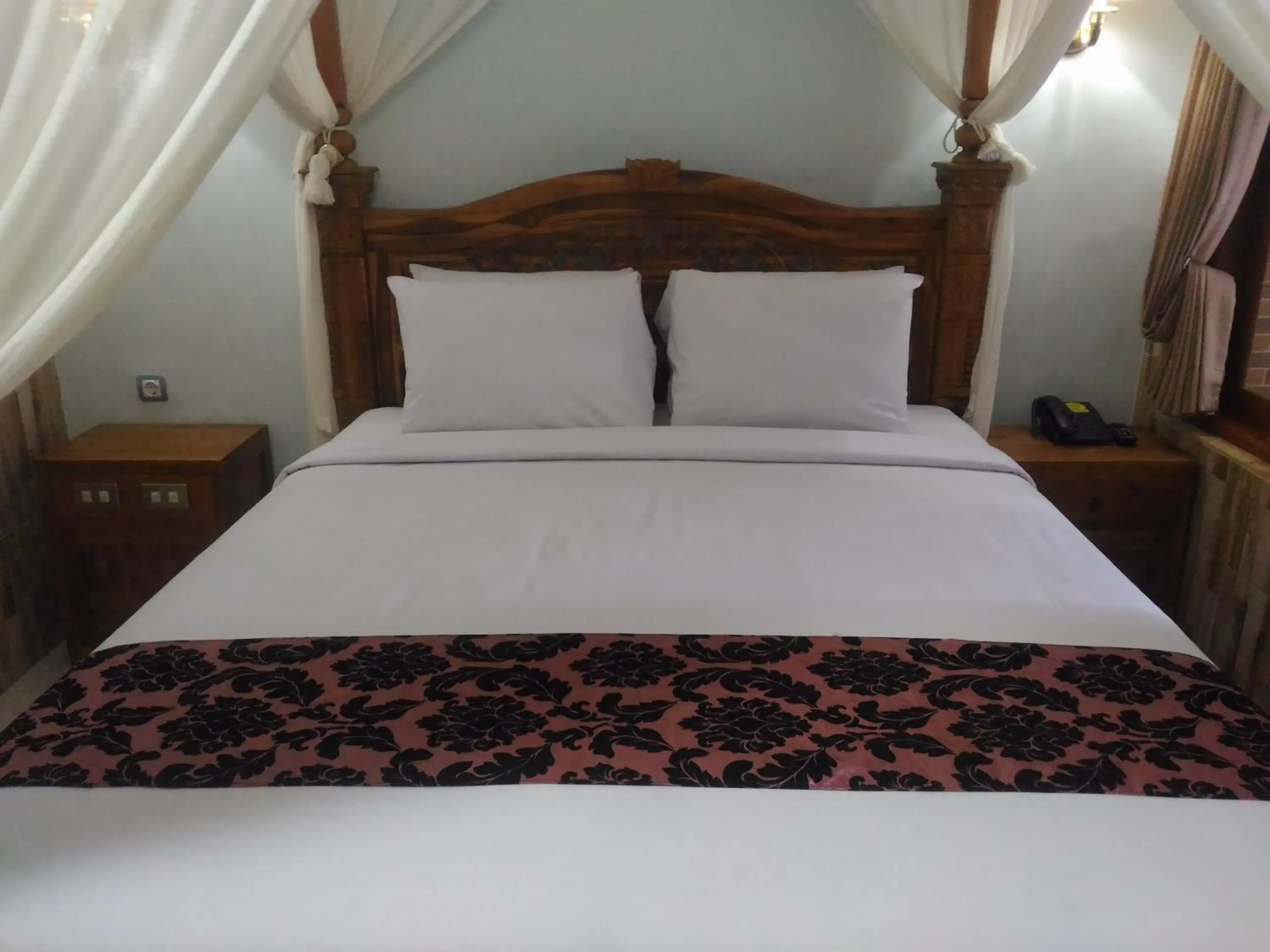 Bed in Hotel Sorga Cottages