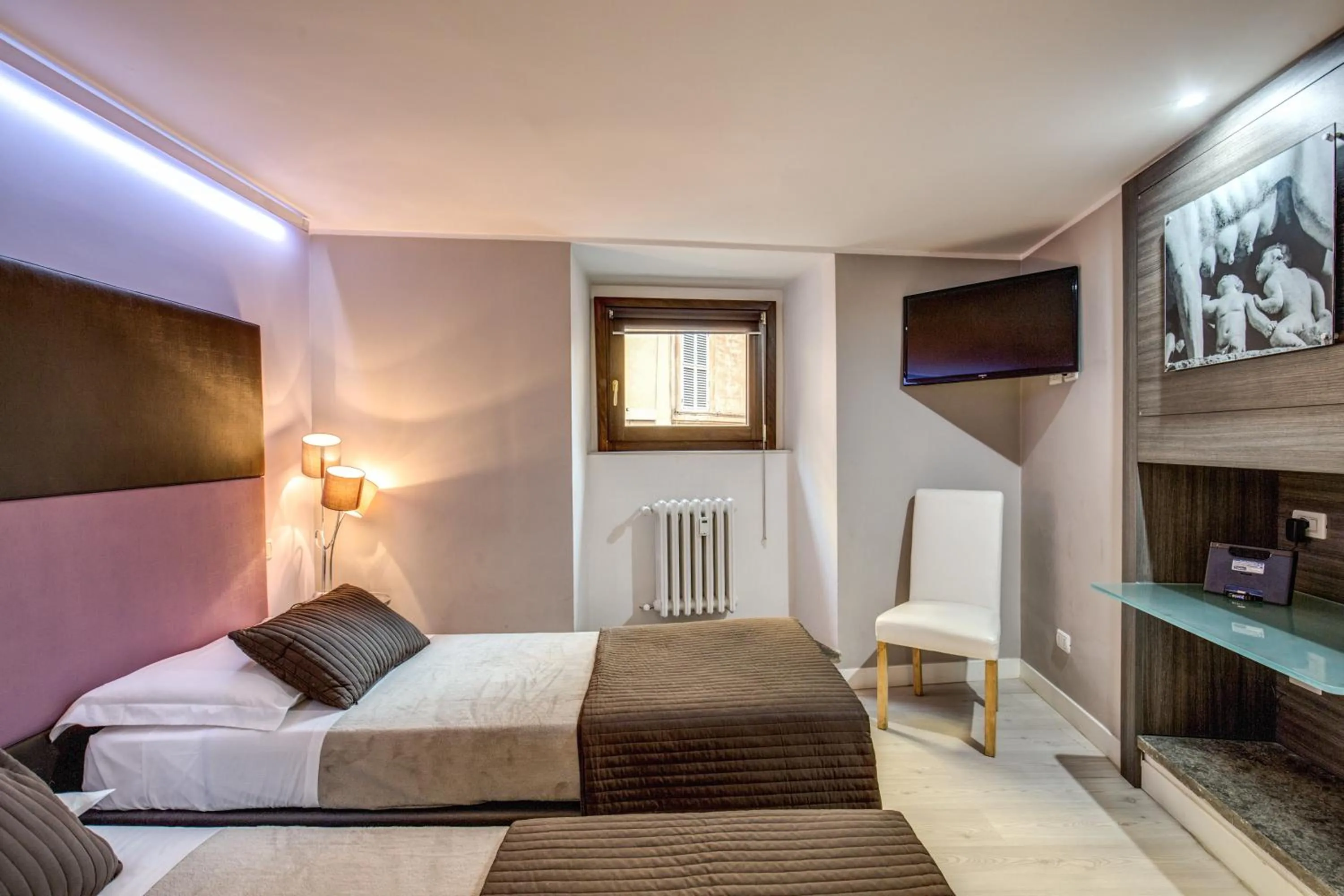 Bedroom, Bed in HiSuiteROME - ApartHotel