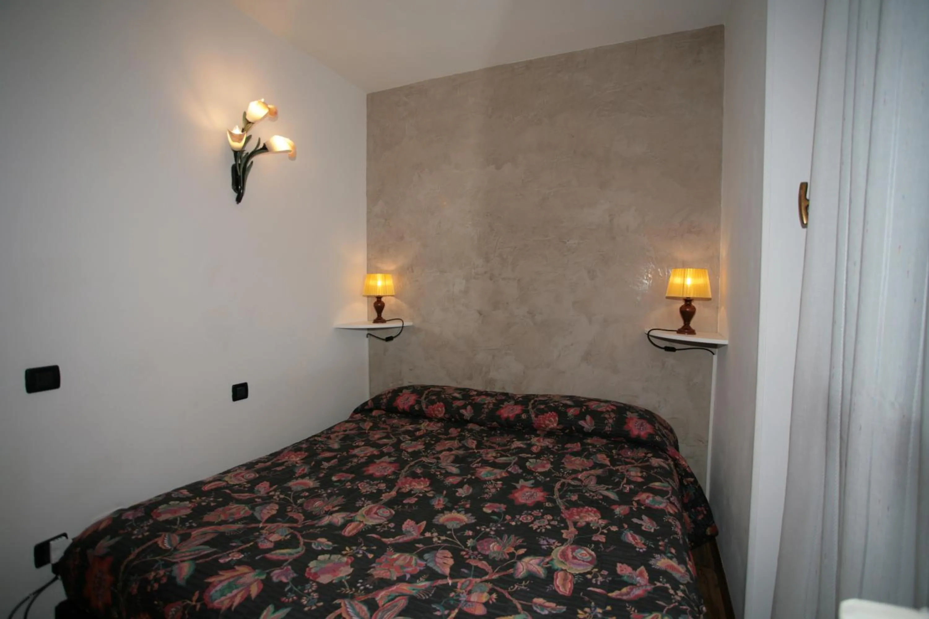 Bedroom in Residence Valfassa