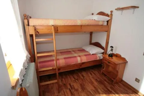 Bedroom in Residence Valfassa