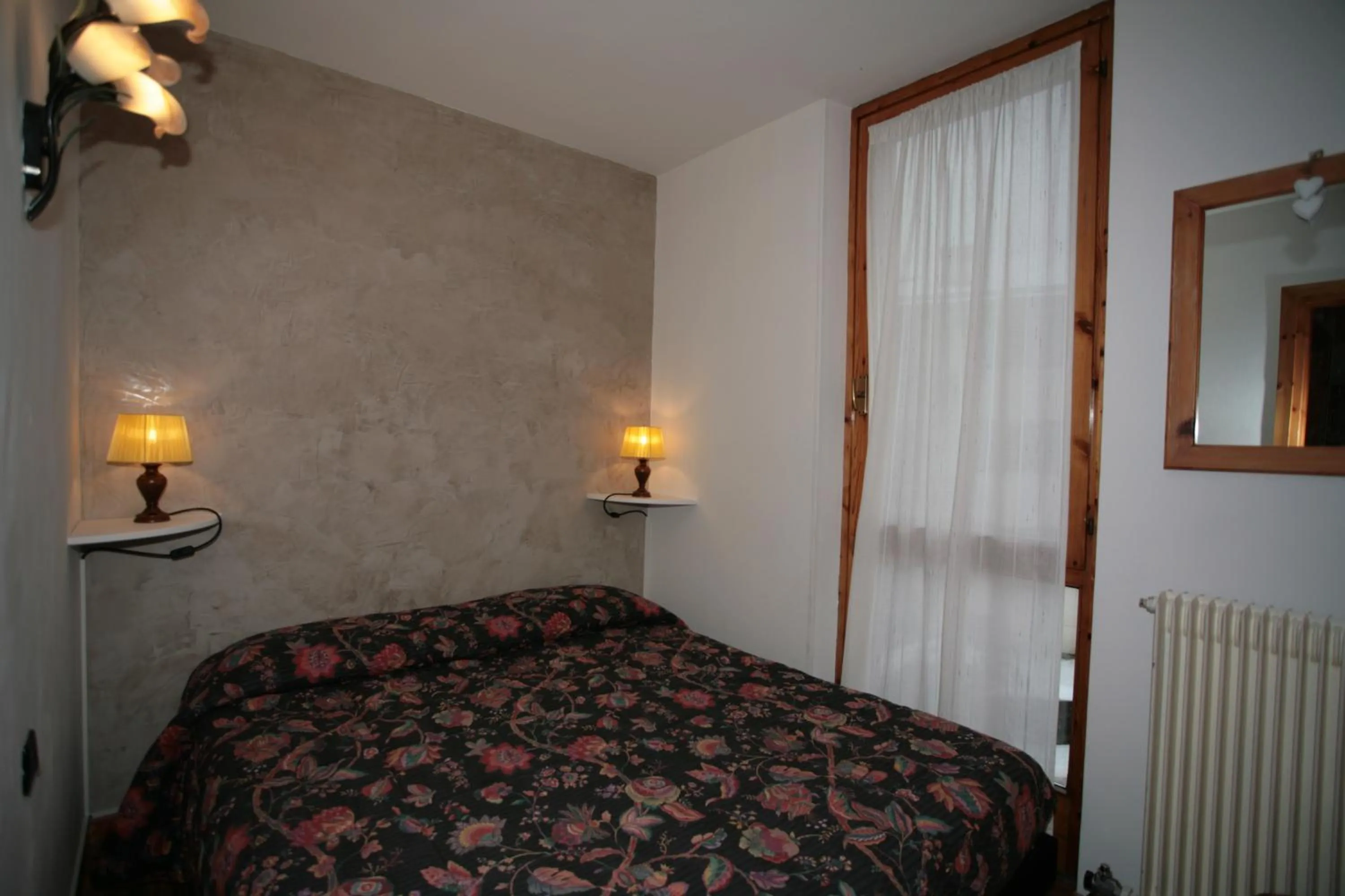 Bedroom in Residence Valfassa