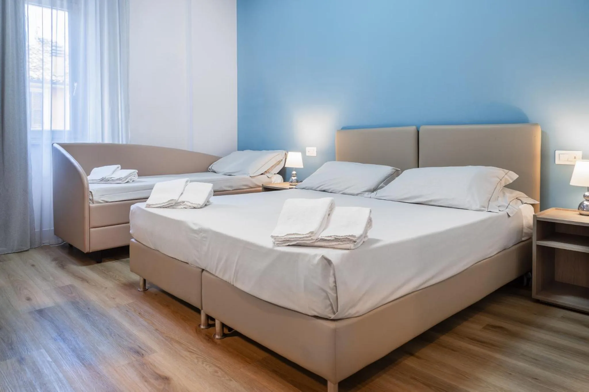 Bed in Hotel De La Ville depandance di Hotel Augustus