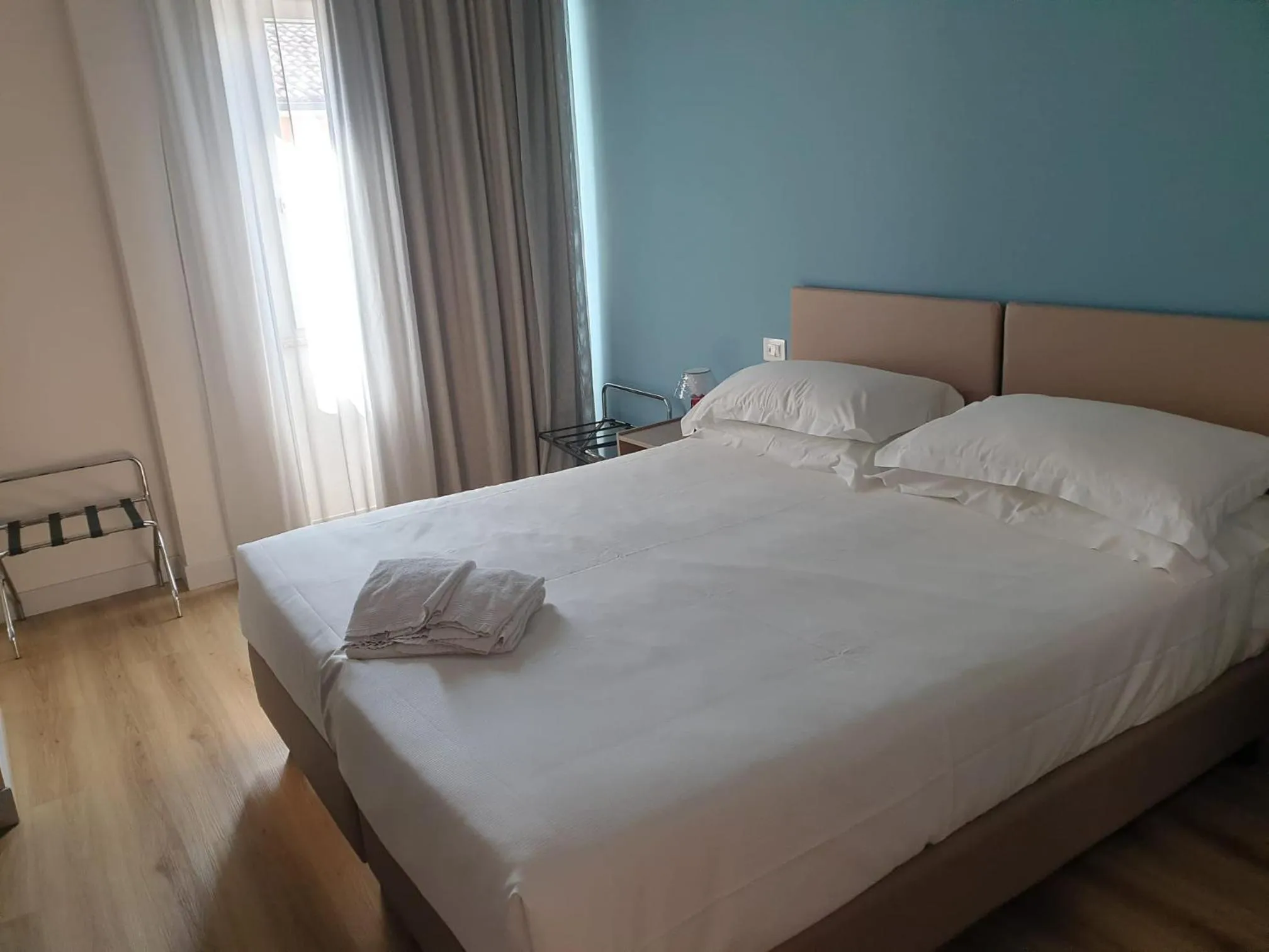 Bed in Hotel De La Ville depandance di Hotel Augustus