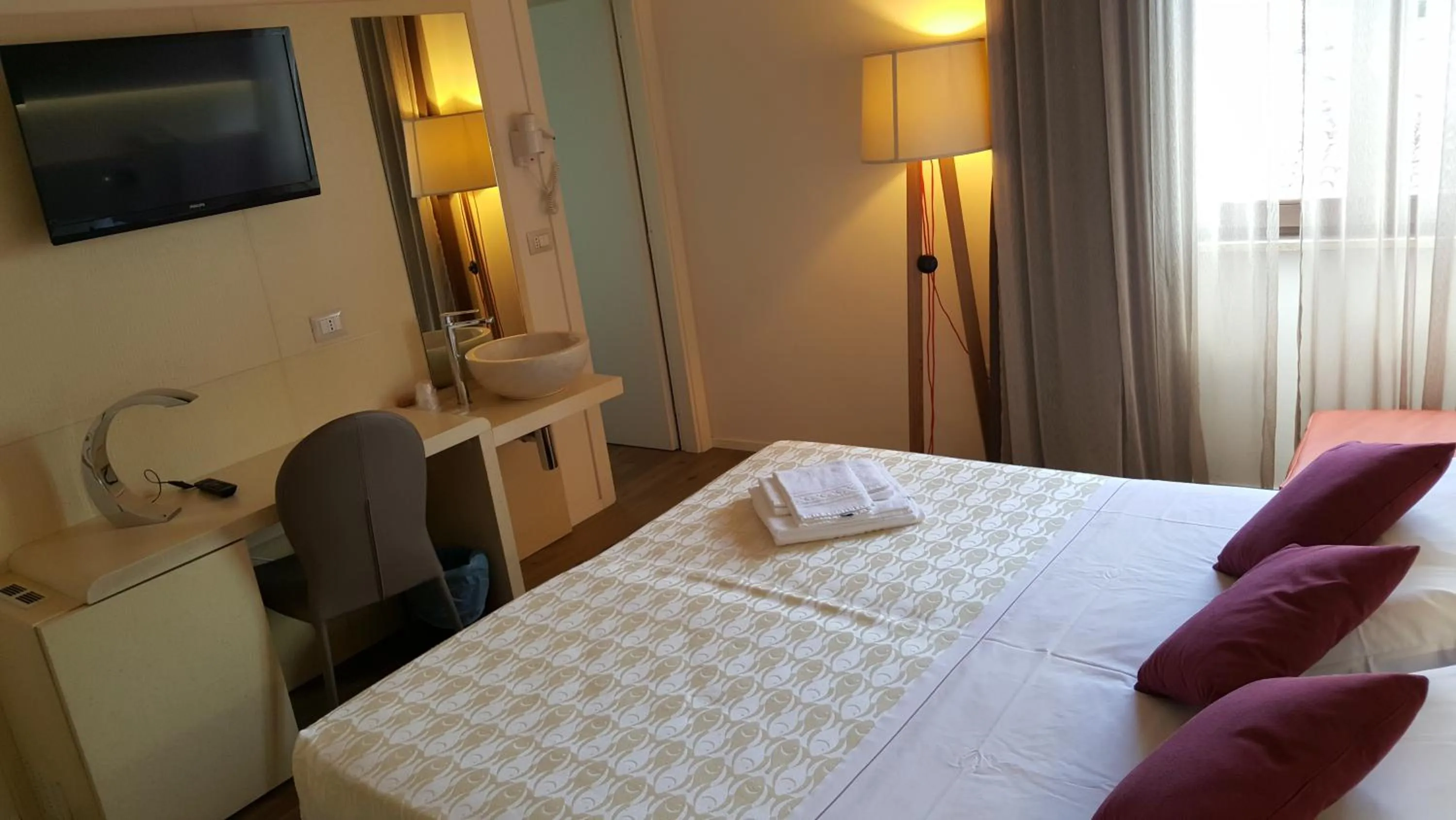 Bed in Hotel De La Ville depandance di Hotel Augustus