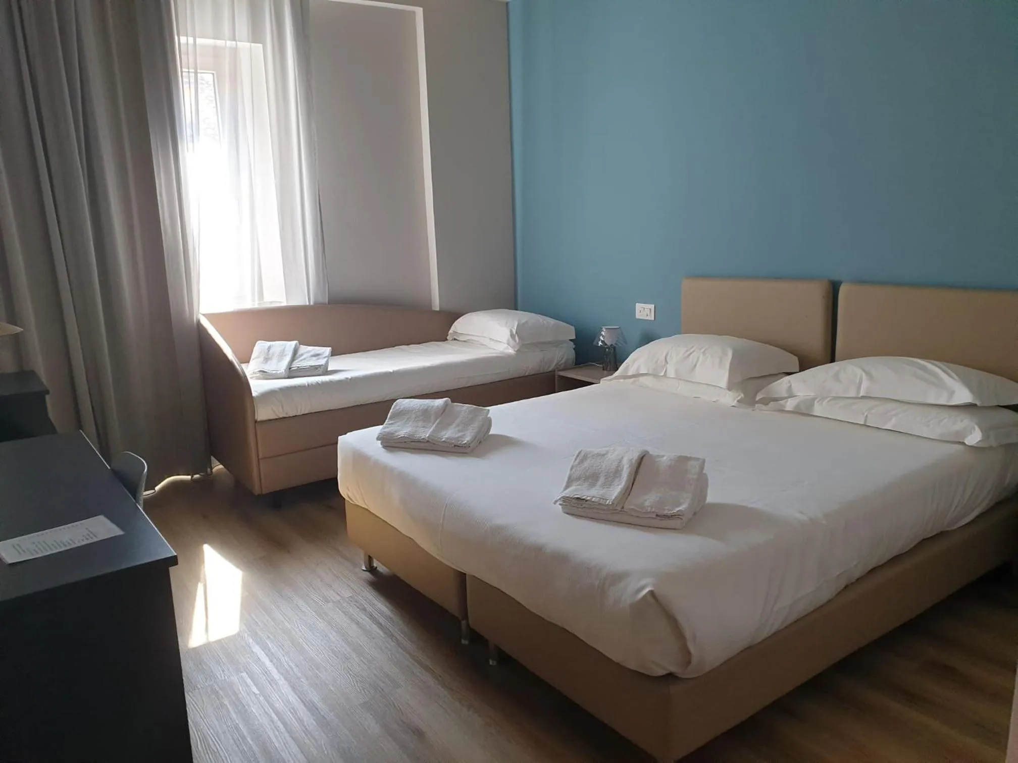 Bed in Hotel De La Ville depandance di Hotel Augustus