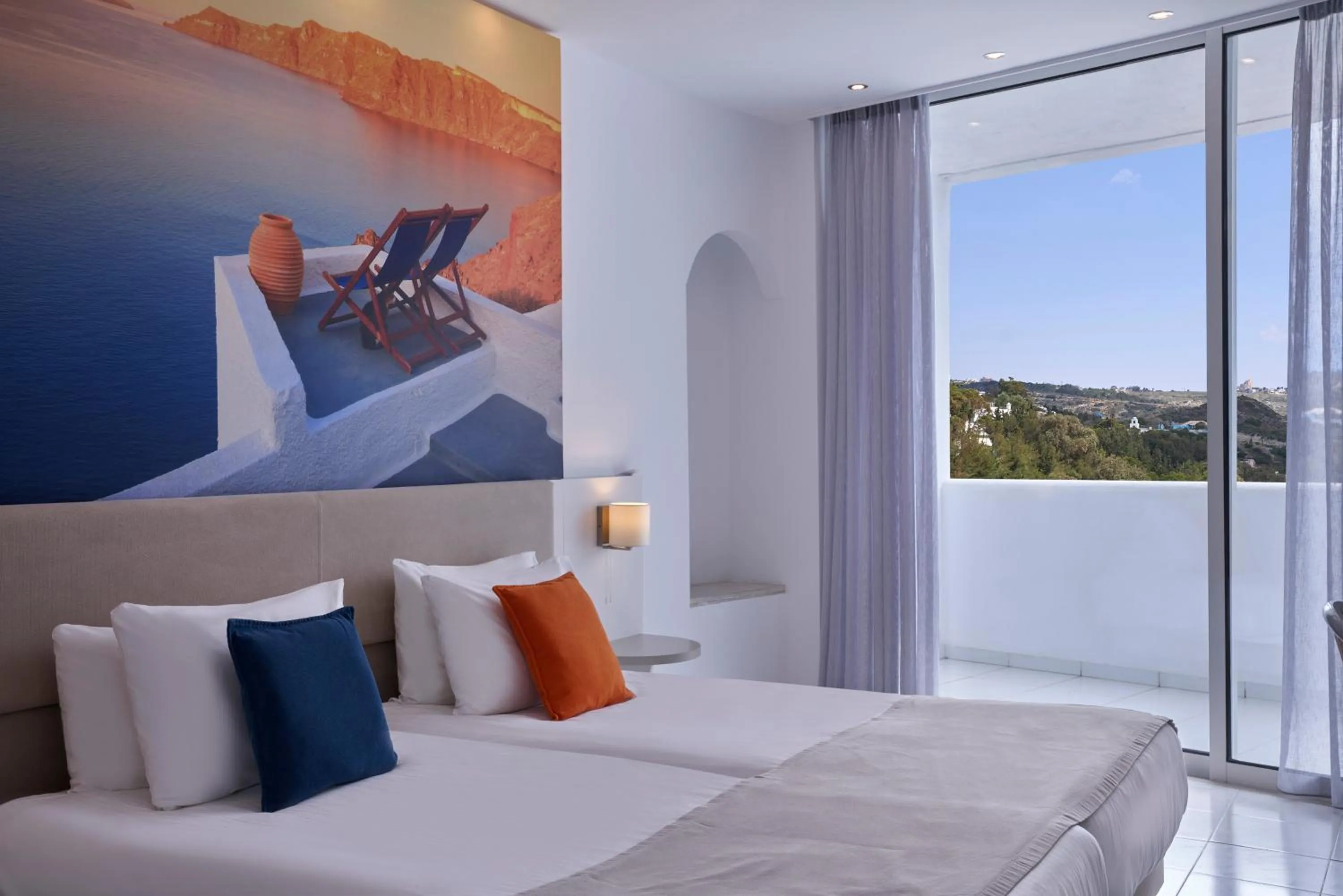 Bed in Epsilon Hotel Apartments