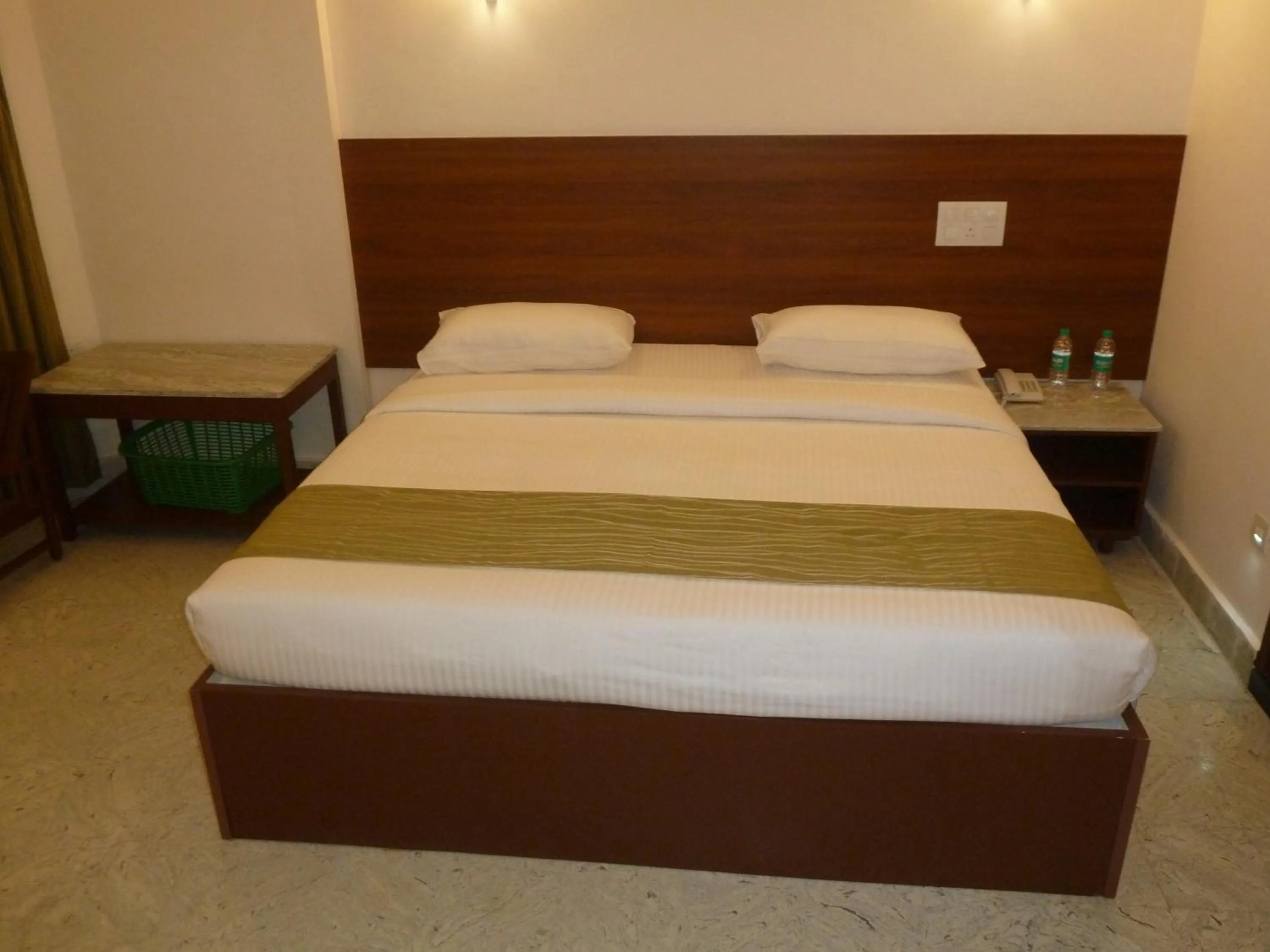 Bed in Sreeparthi Hotel