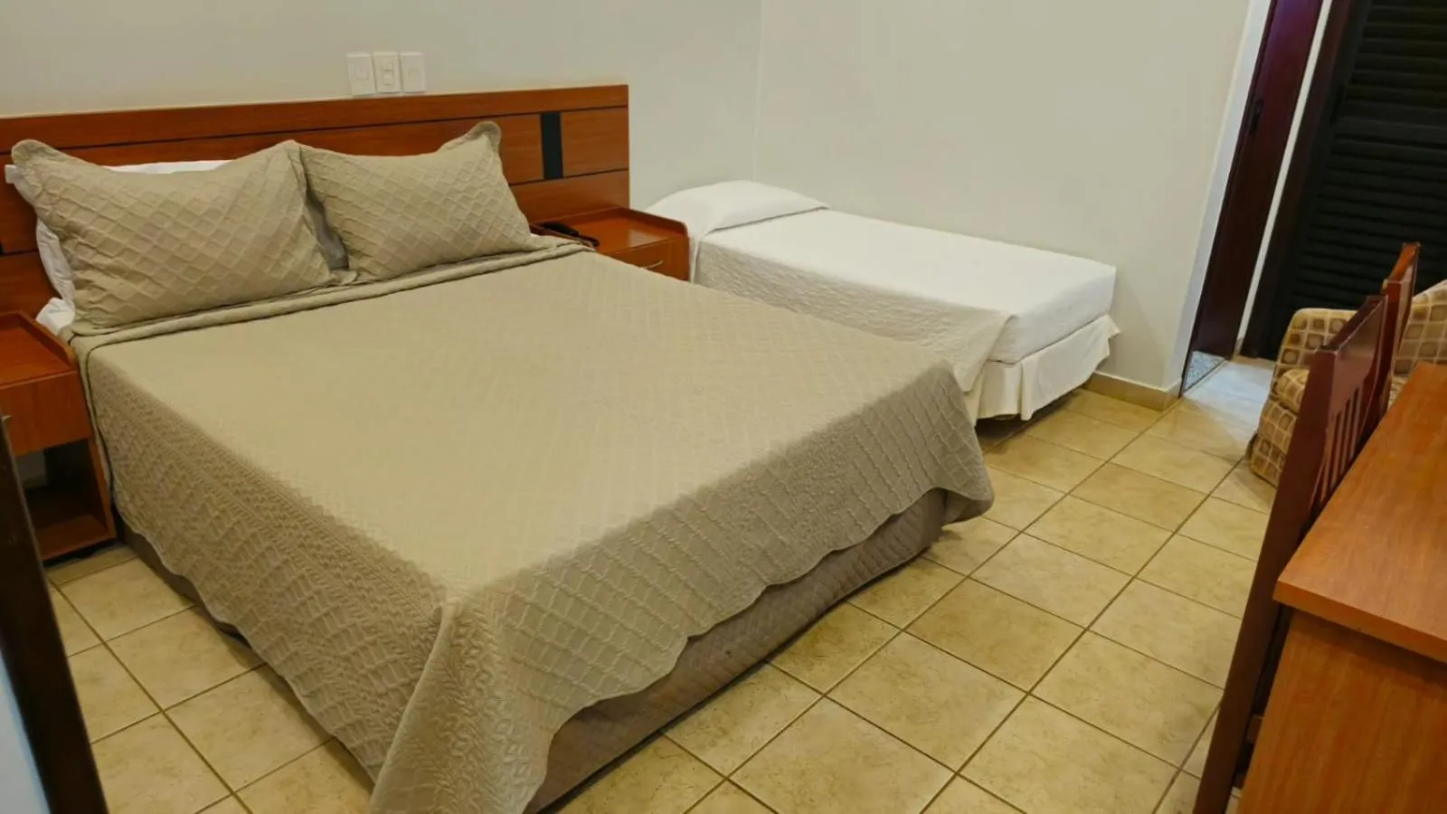 Bed in Hotel das Palmeiras