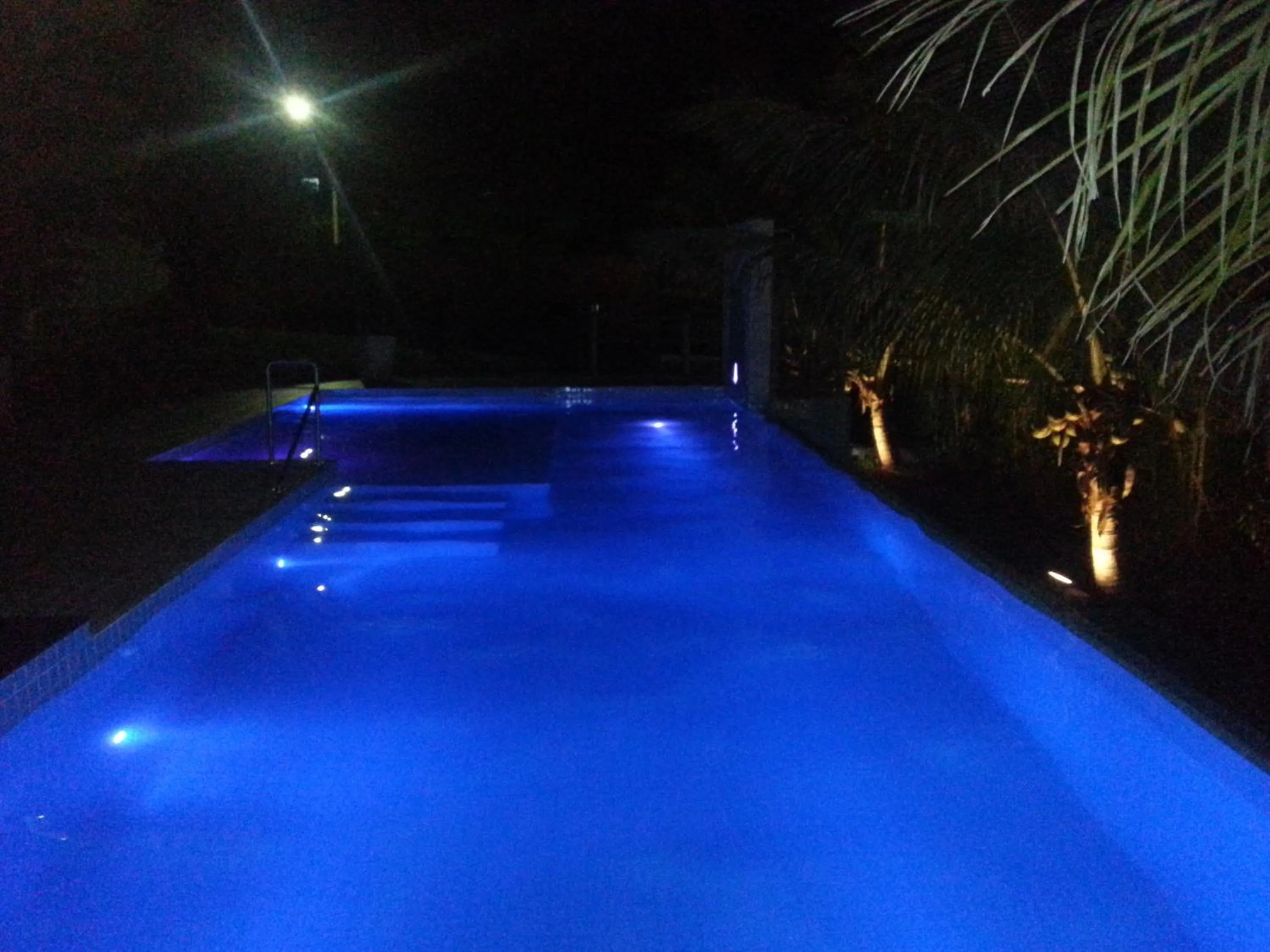 Swimming pool in Hotel das Palmeiras