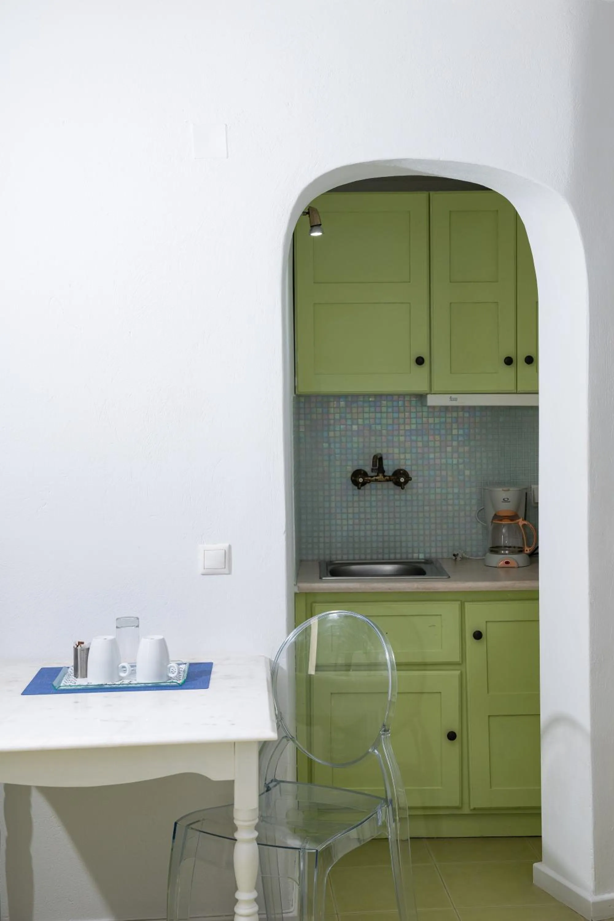 Kitchen or kitchenette in Avant Garde Suites