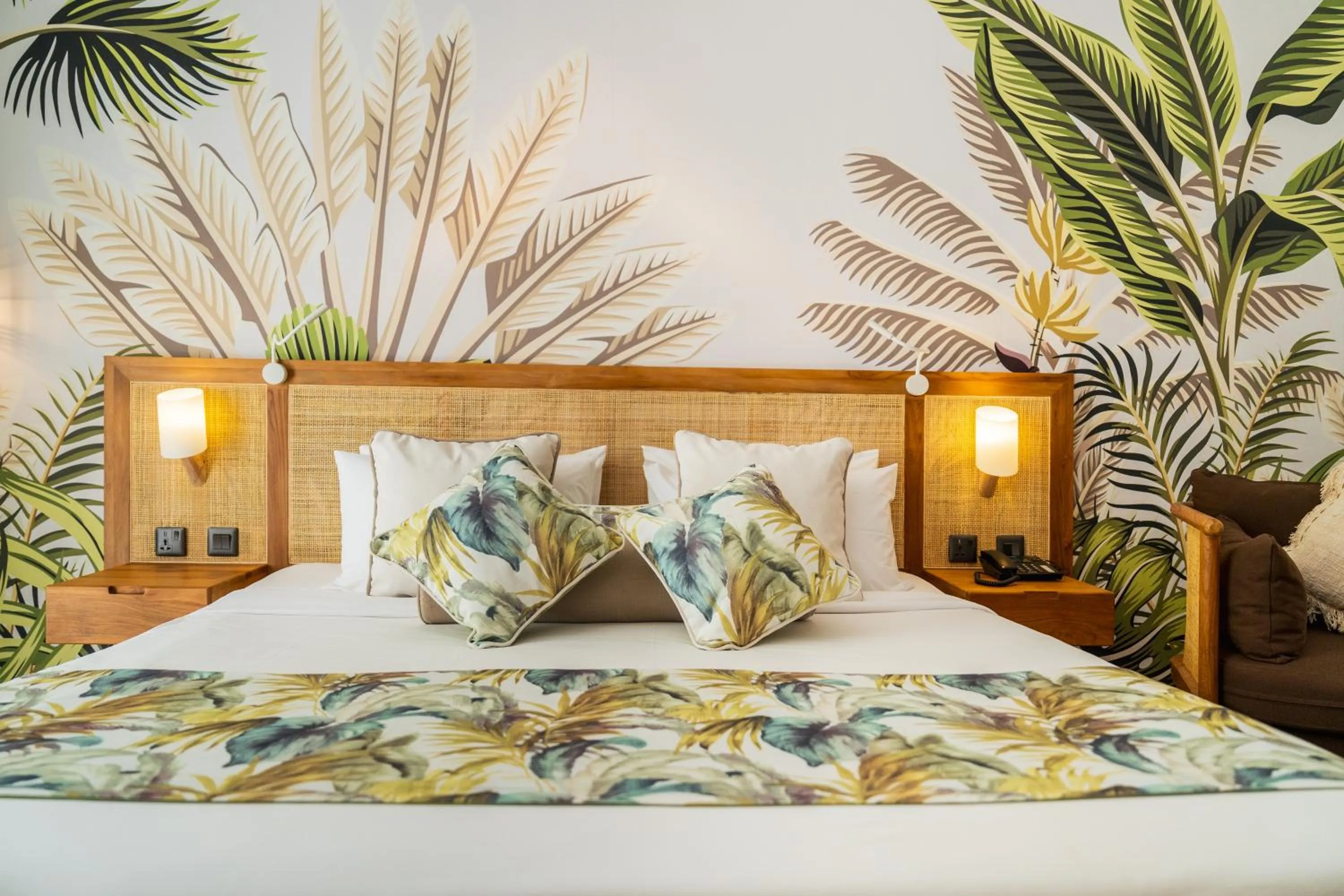 Bed in Casuarina Resort and Spa