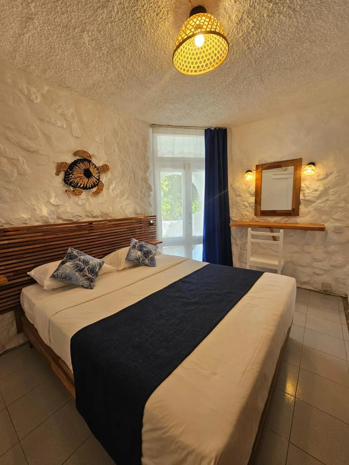 Bed in Casuarina Resort and Spa