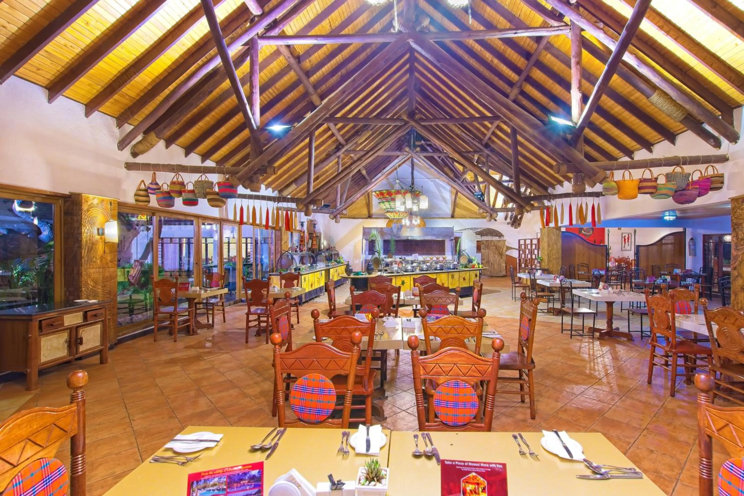 Communal lounge/ TV room in Muthu Keekorok Lodge, Maasai Mara, Narok