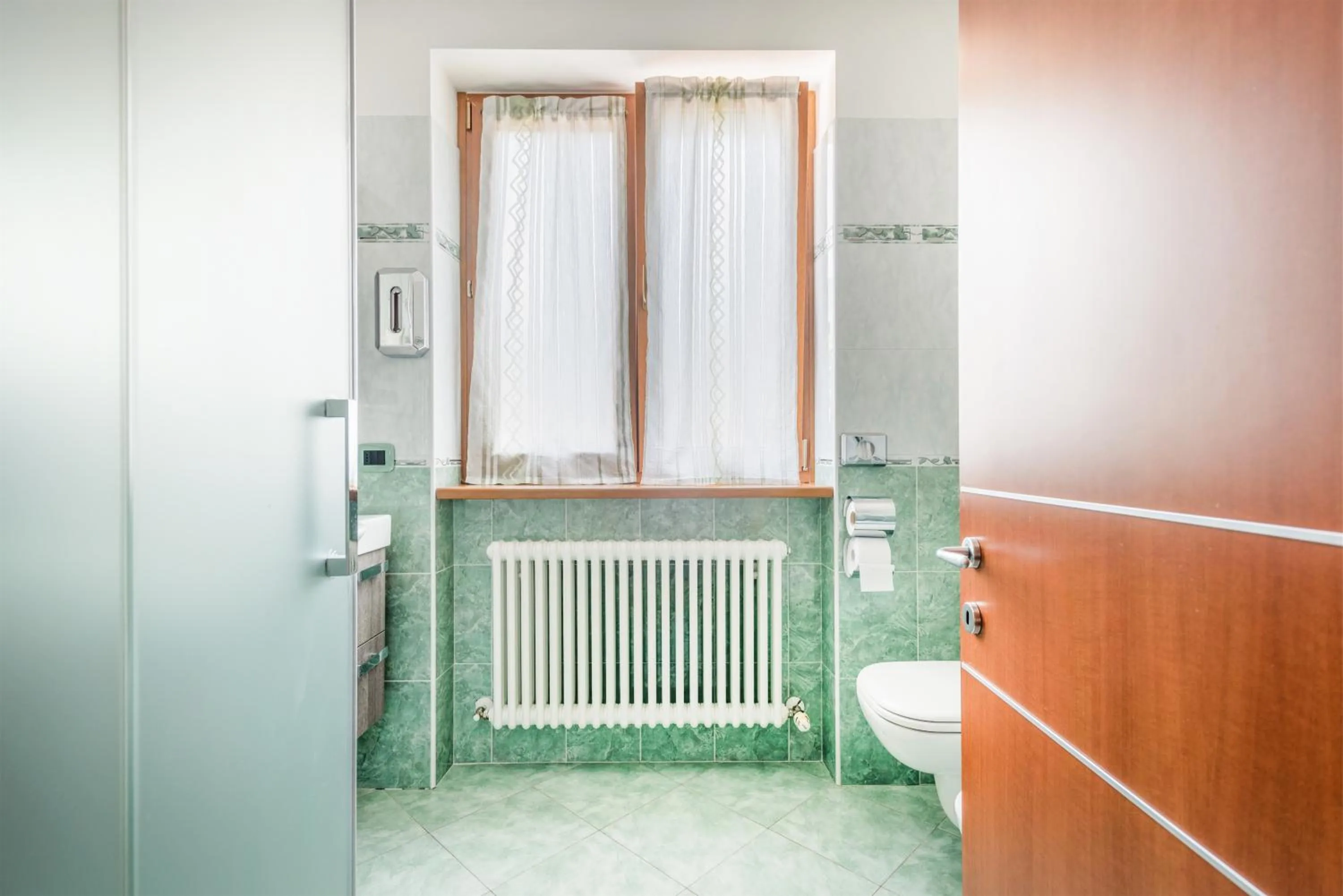 Bathroom in CROSINA HOLIDAY - Residence Toli