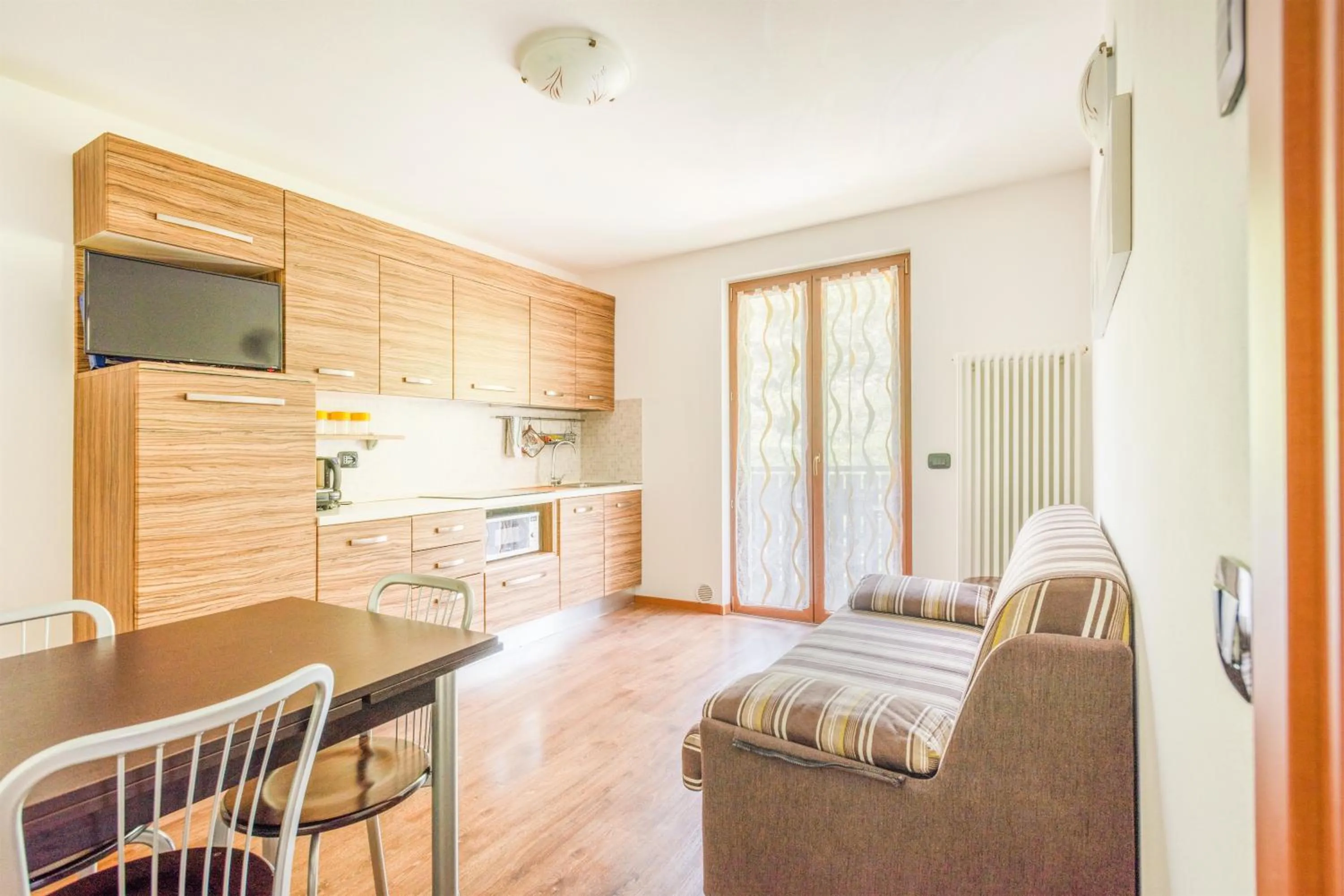 Kitchen or kitchenette in CROSINA HOLIDAY - Residence Toli